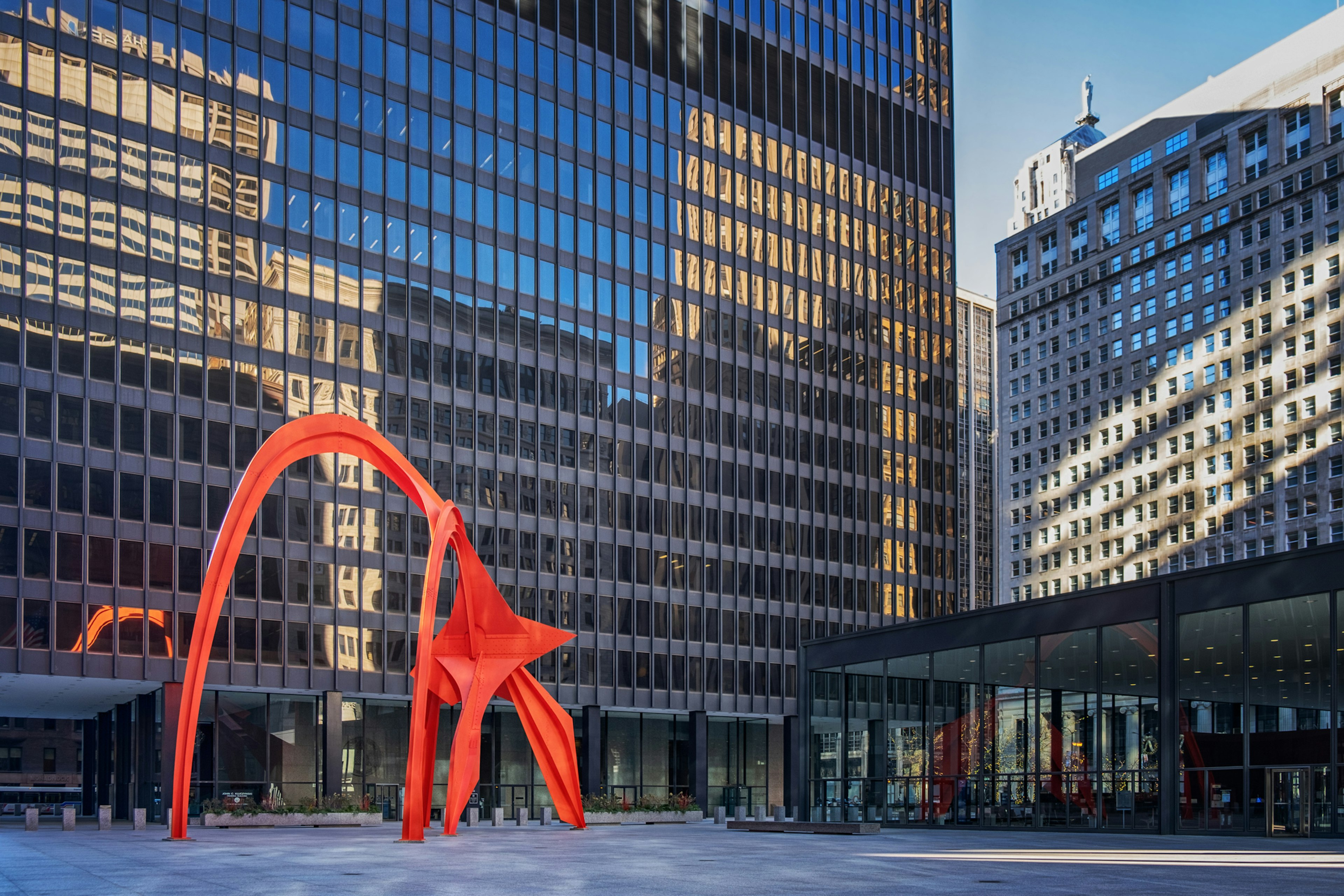 The sculpture Flamingo by Alexander Calder in front of the Kluczynski Federal Building in Chicago, Illinois.