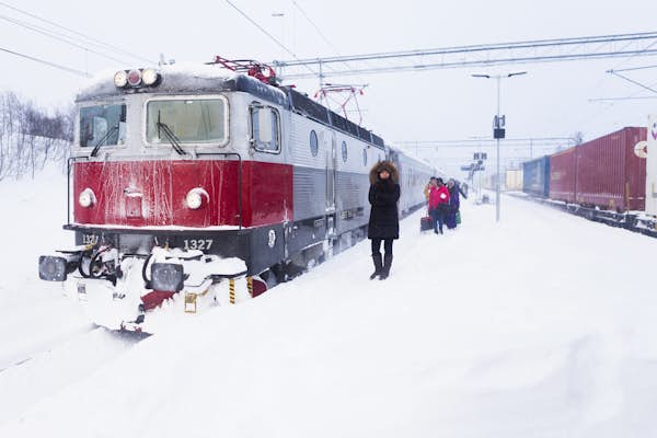 Aurora borealis over a snowy landscape