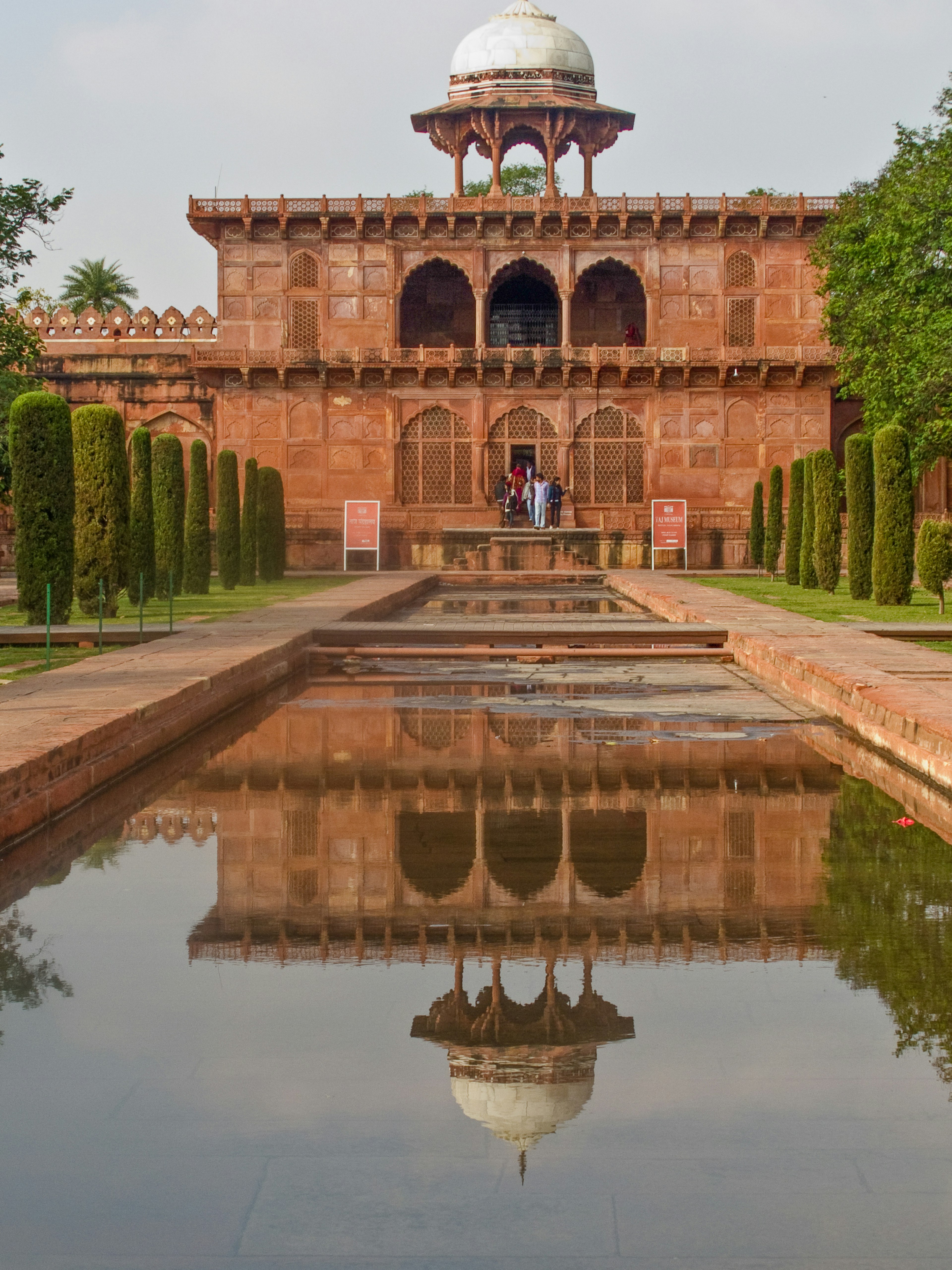 Taj Mahal, Agra. 1631-1653. Taj Mahal Museum. Chatri on roof. Red sandstone mosque and reflecting pool in grounds of Taj Mahal.
