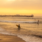 Surfers ride waves during sunset at Huanchaco in Peru.
Travel, Sunlight, Surf, South America, Trujillo, Wave - Water, Pier, Fishing, Summer, Real People, Color Image, Tranquility, Huanchaco, Back Lit, Equipment, Surfboard, Eco Tourism, Trujillo - Peru, Hipster - Person, Beach, Freedom, Zen-like, Landscape - Scenery, Outdoors, Adventure, Photography, Horizontal, Cloudscape, Dusk, Season, Technology, Lifestyles, Colors, Waving, Screen Saver, Sea, Beach Holiday, Extreme Sports, Tourism, Surfing the Net, Peru, Idyllic, Healthy Lifestyle, Small Group Of People, Vertical, Coastal Feature, Surfing, Exercising, Coastline, Sunset, People, Nature, Abstract