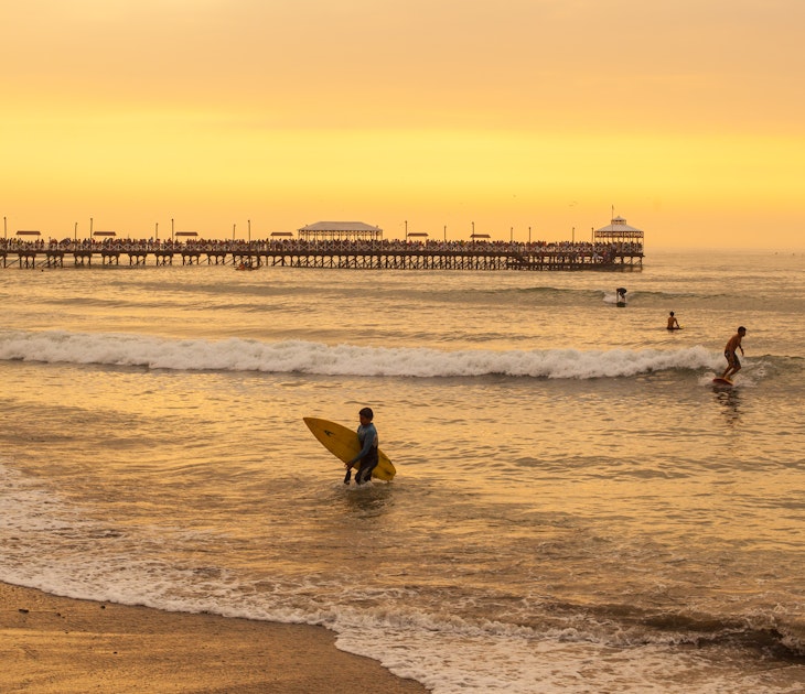 Surfers ride waves during sunset at Huanchaco in Peru.
Travel, Sunlight, Surf, South America, Trujillo, Wave - Water, Pier, Fishing, Summer, Real People, Color Image, Tranquility, Huanchaco, Back Lit, Equipment, Surfboard, Eco Tourism, Trujillo - Peru, Hipster - Person, Beach, Freedom, Zen-like, Landscape - Scenery, Outdoors, Adventure, Photography, Horizontal, Cloudscape, Dusk, Season, Technology, Lifestyles, Colors, Waving, Screen Saver, Sea, Beach Holiday, Extreme Sports, Tourism, Surfing the Net, Peru, Idyllic, Healthy Lifestyle, Small Group Of People, Vertical, Coastal Feature, Surfing, Exercising, Coastline, Sunset, People, Nature, Abstract