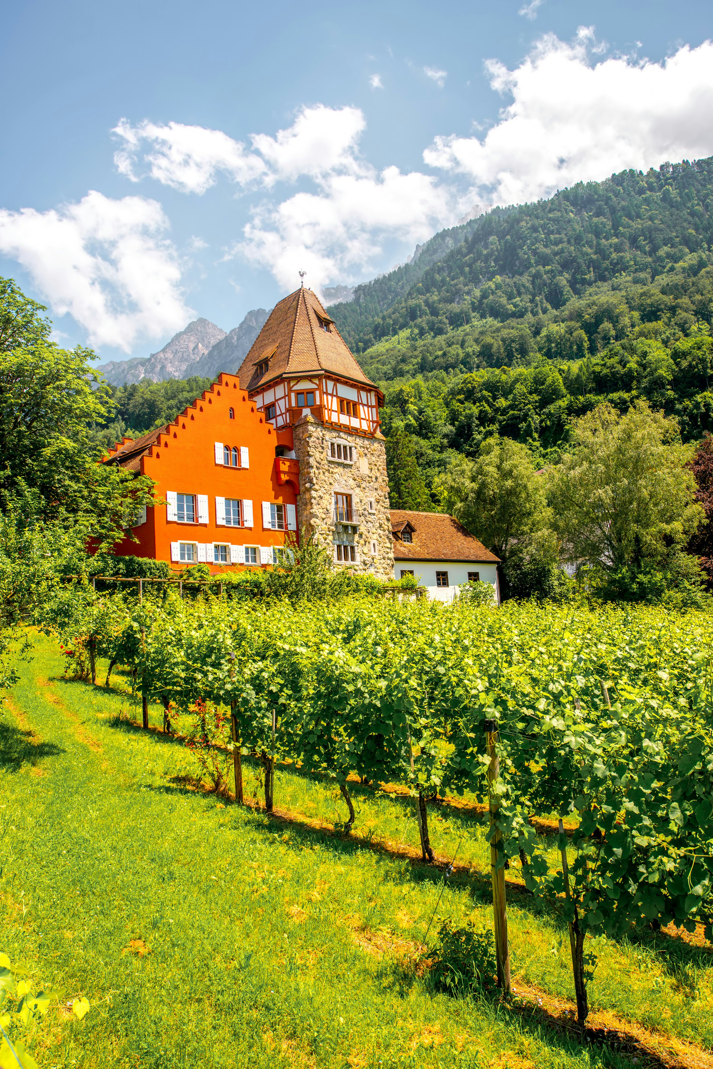 Famous red house with wineyard owned by the Rheinberger family in Vaduz city, Liechtenstein. This house is very popular tourist attraction in Liechtenstein