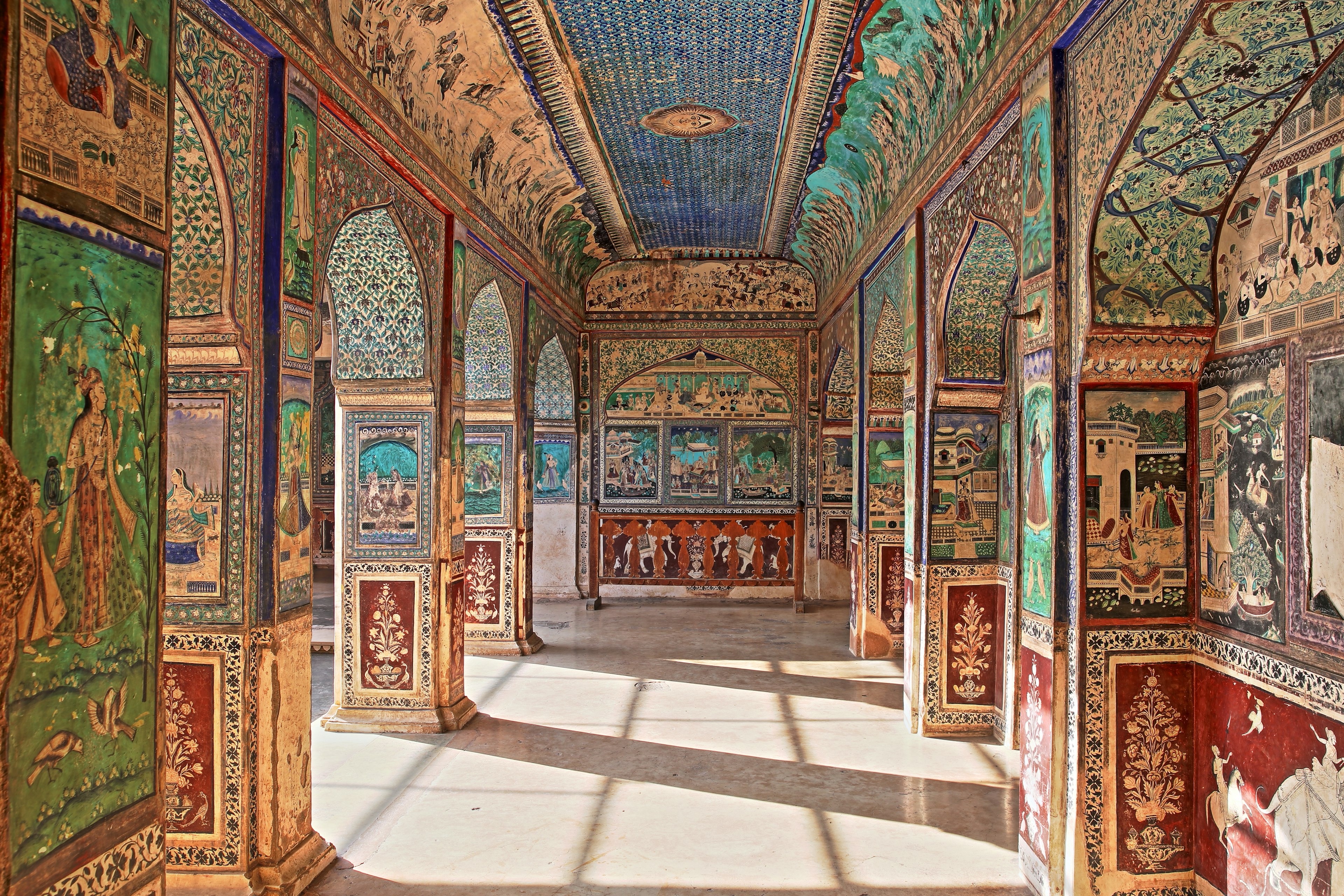 Intricate murals inside the Chitrasala palace at Bundi, Rajasthan.