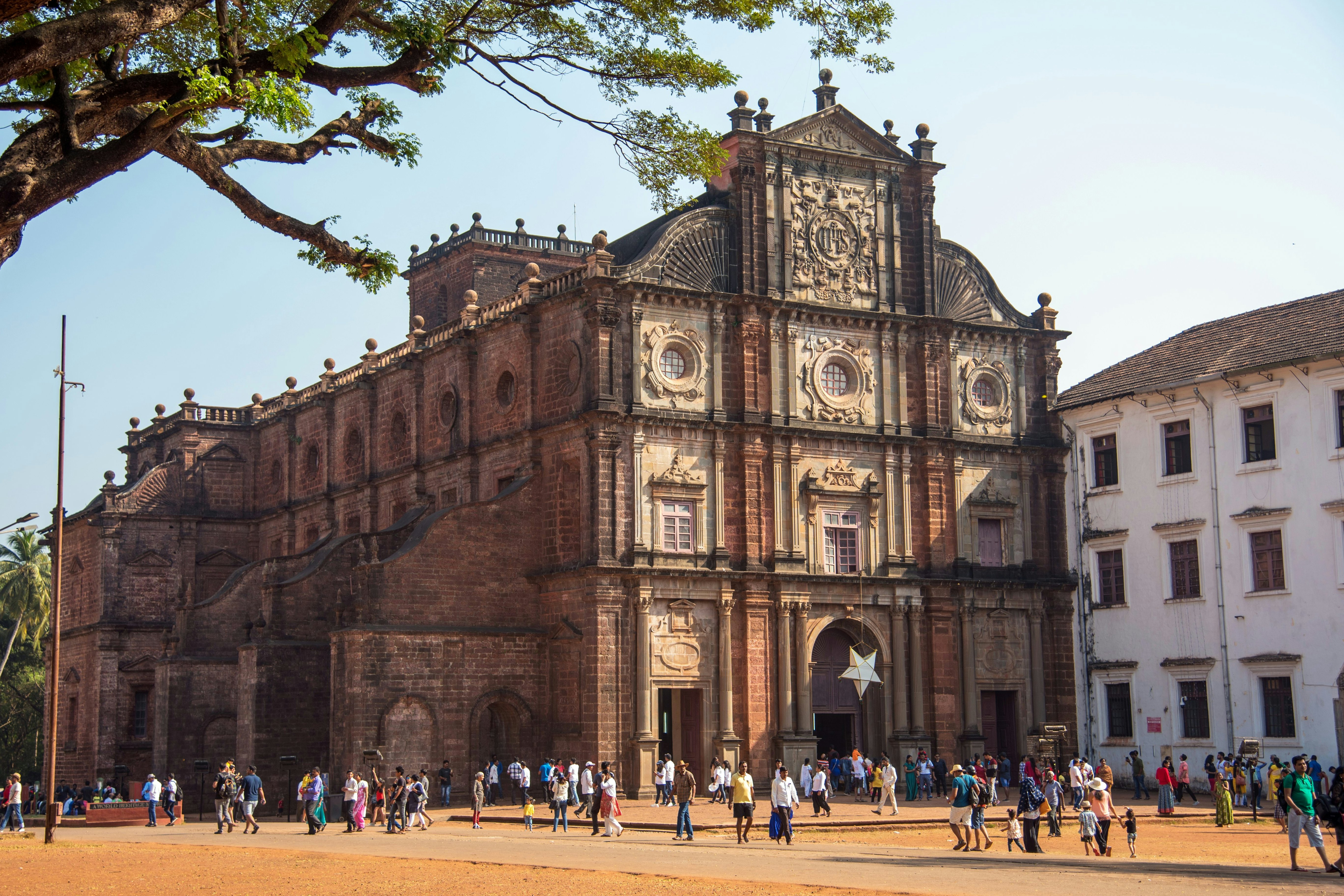 Tourists visit the famous Basilica of Bom Jesus in Old Goa, India.