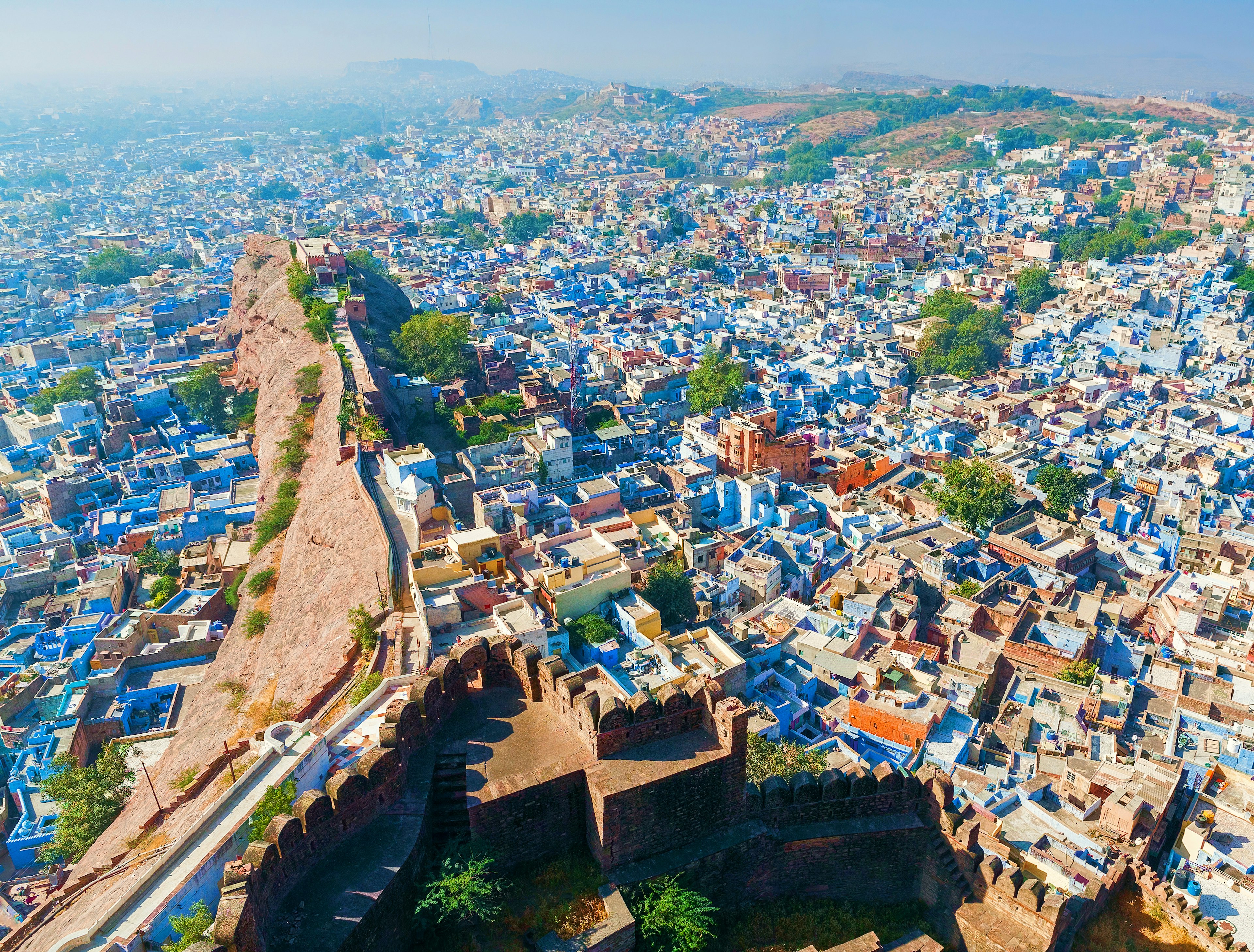 The towering Mehrangarh fort looks over the Blue City of Jodhpur in Rajasthan, India.