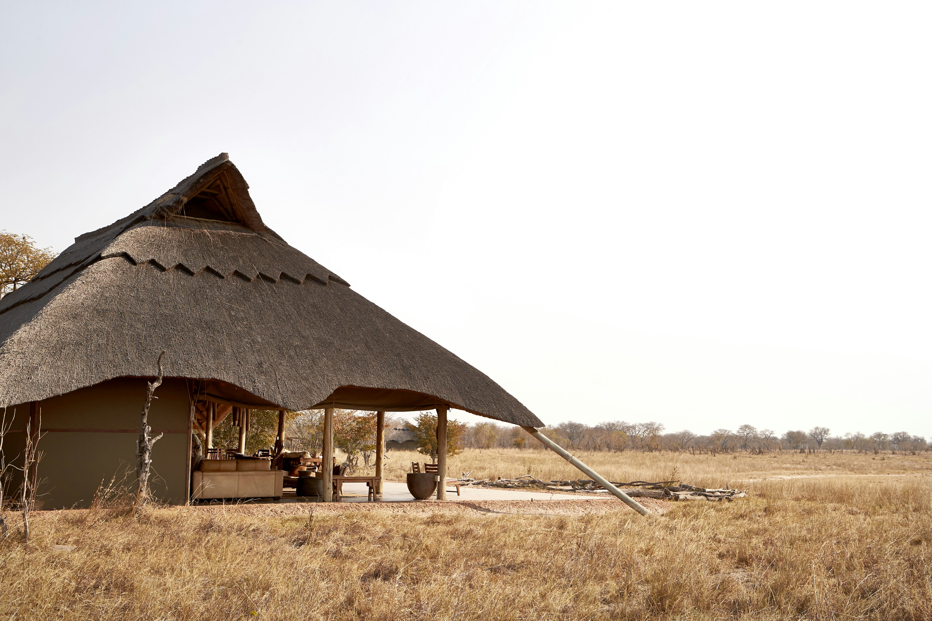 Camp Hwange with traditional grass roof.