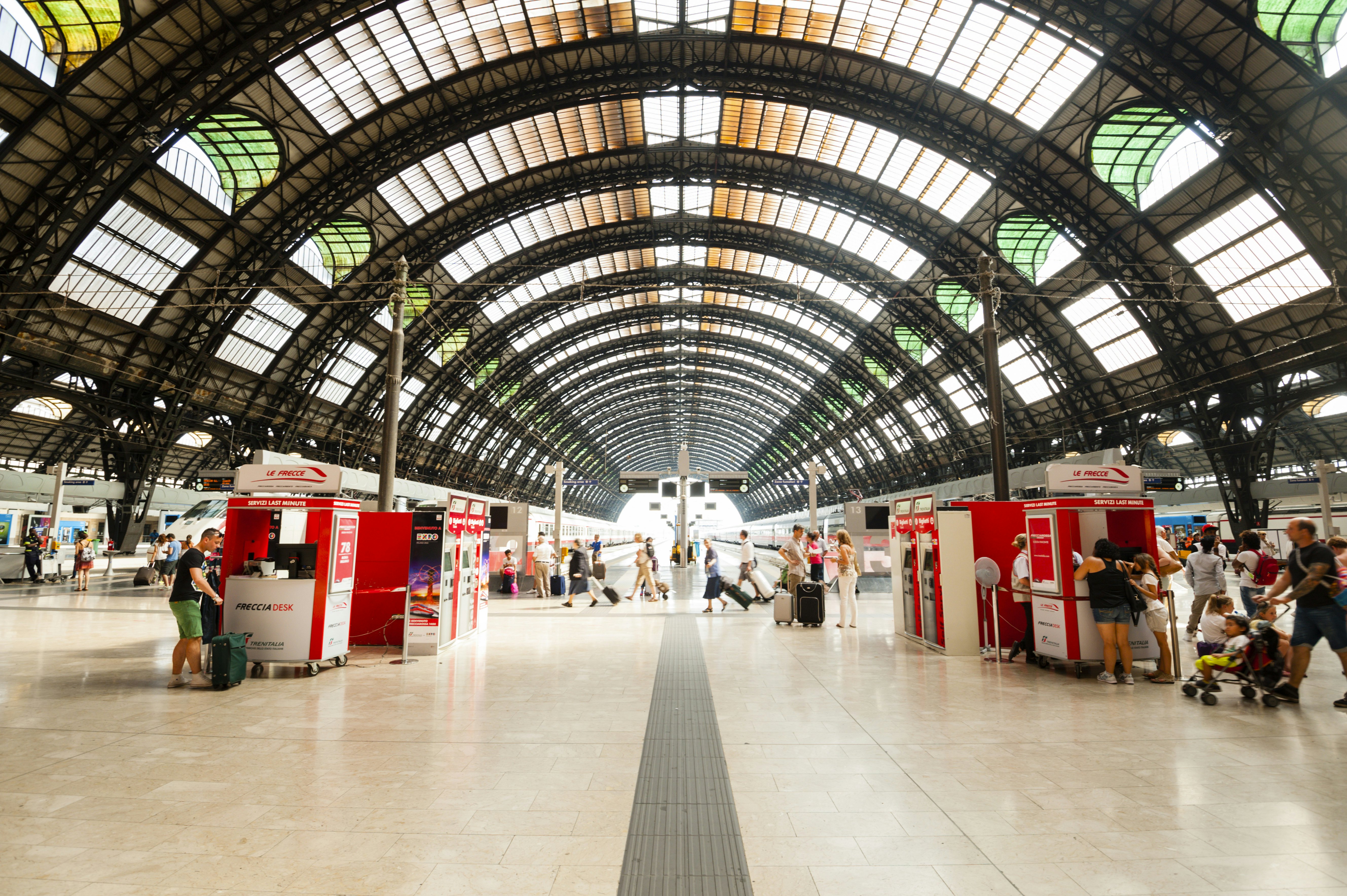 Wide shot of the concourse of Milan’s Stazione Centrale, Italy's second largest railway station.