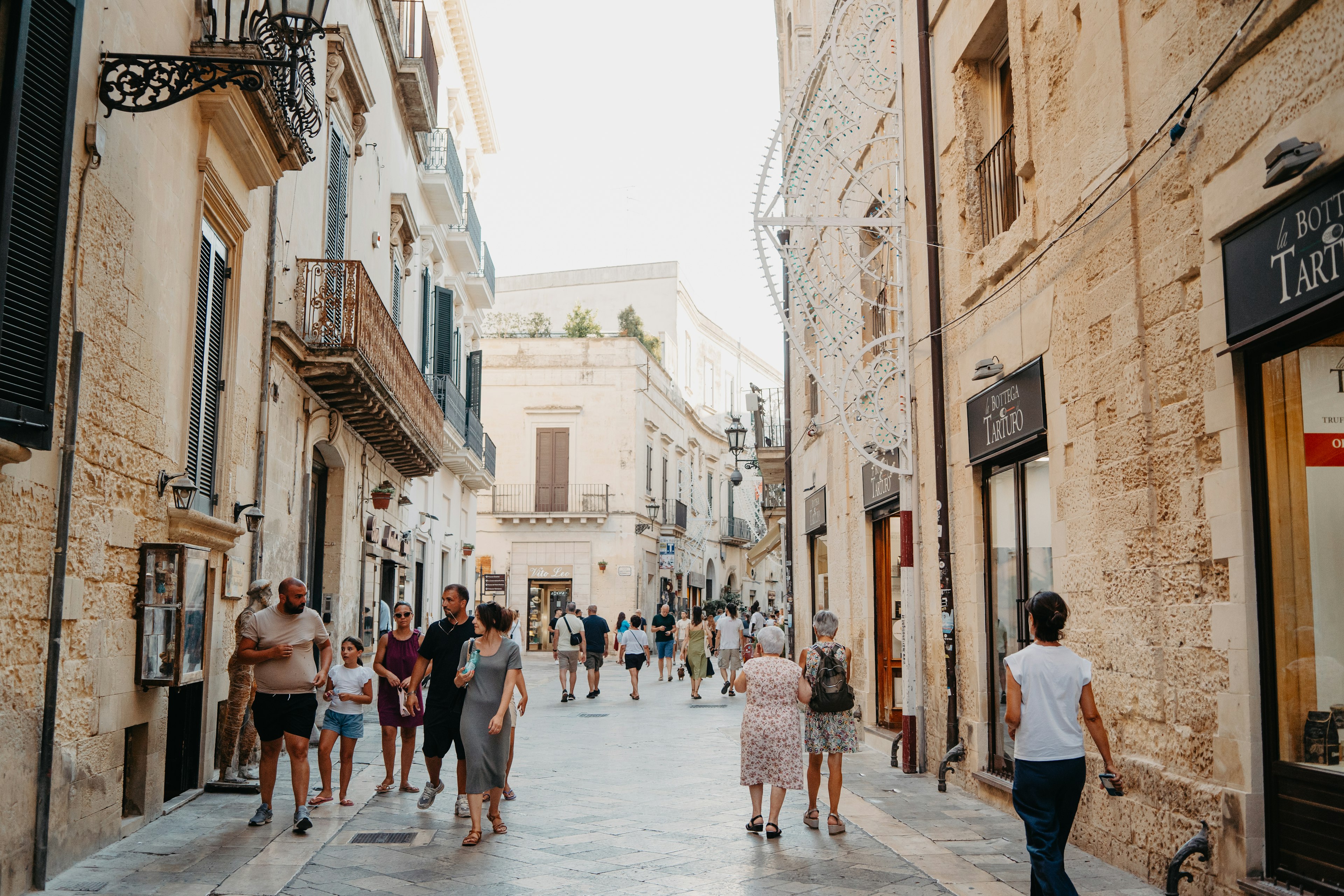 Old town street life in Lecce, Puglia