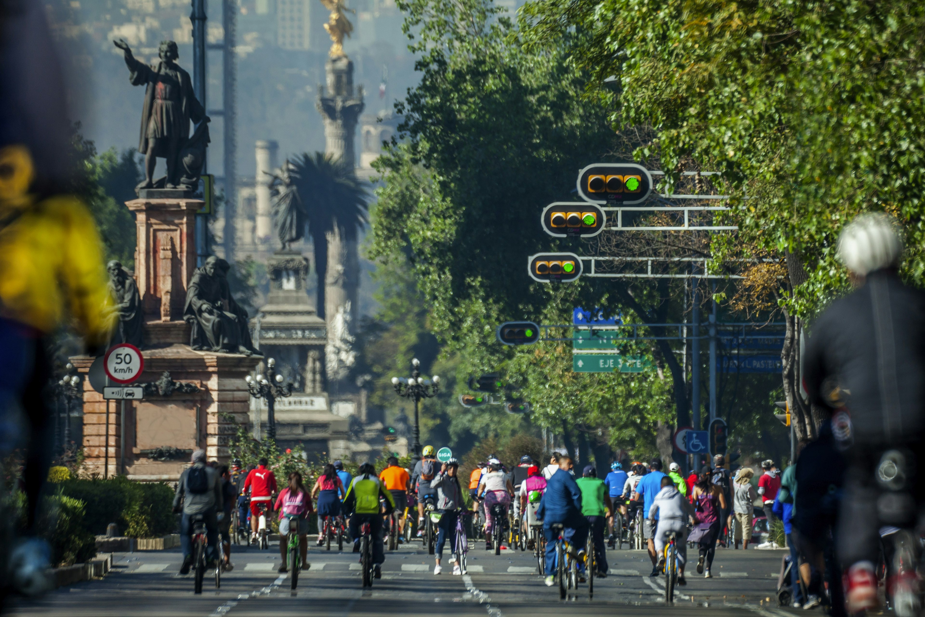 People cycling on Avenida Paseo de la Reforma, Mexico City.