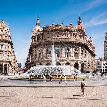 Genoa, Liguria / Italy - 07 08 2018: View of Piazza Raffaele de Ferrari, in the middle Palazzo della Nuova Borsa - country stock exchange. License Type: media Download Time: 2023-08-31T01:12:16.000Z User: mvm_lonelyplanet Is Editorial: Yes purchase_order: