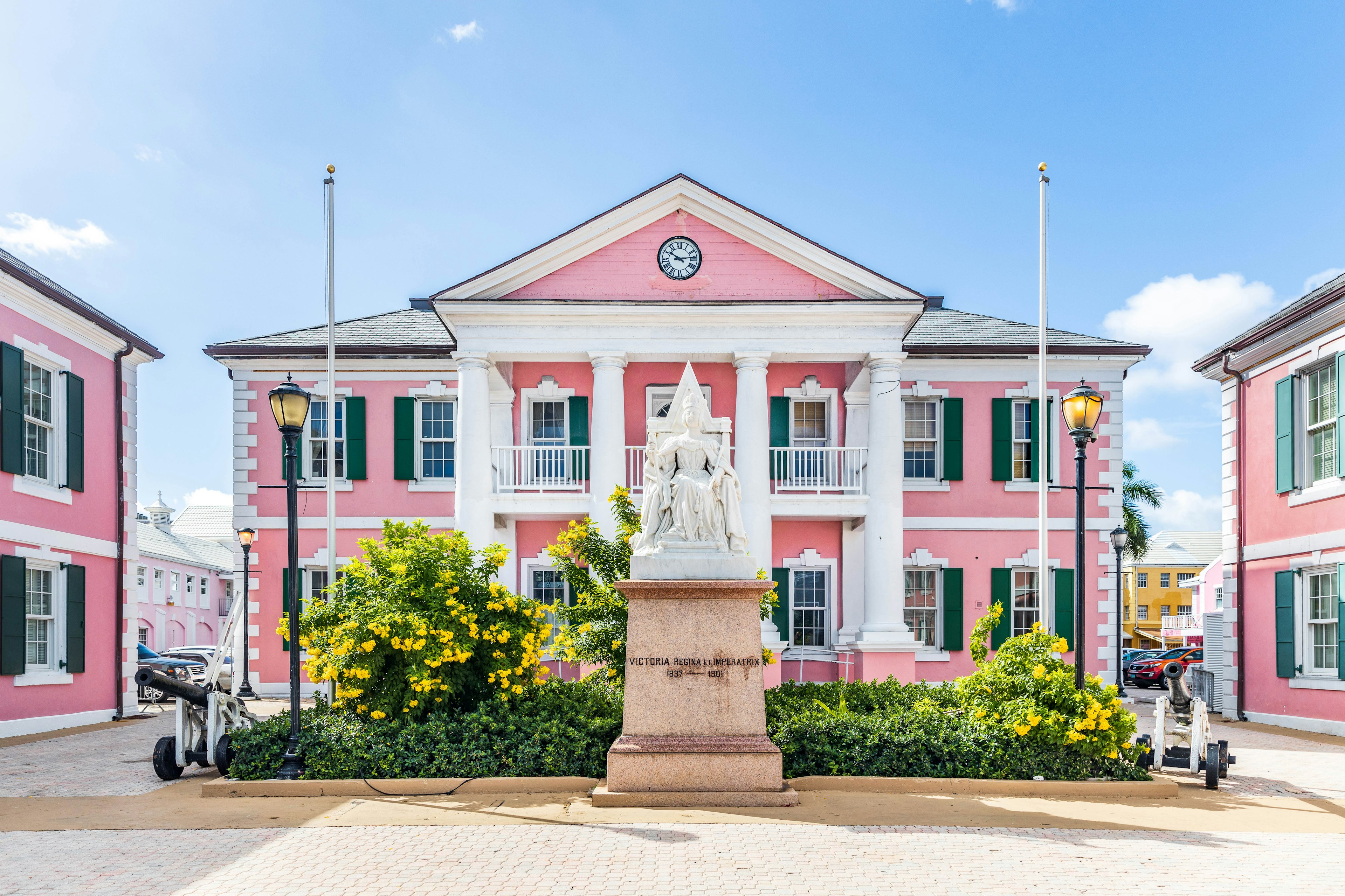 NASSAU, BAHAMAS - OCTOBER 13, 2019: Parliament Square is a group of government buildings that were built in 1815. The buildings are painted in a flamingo pink and are modeled after New Bern, NC