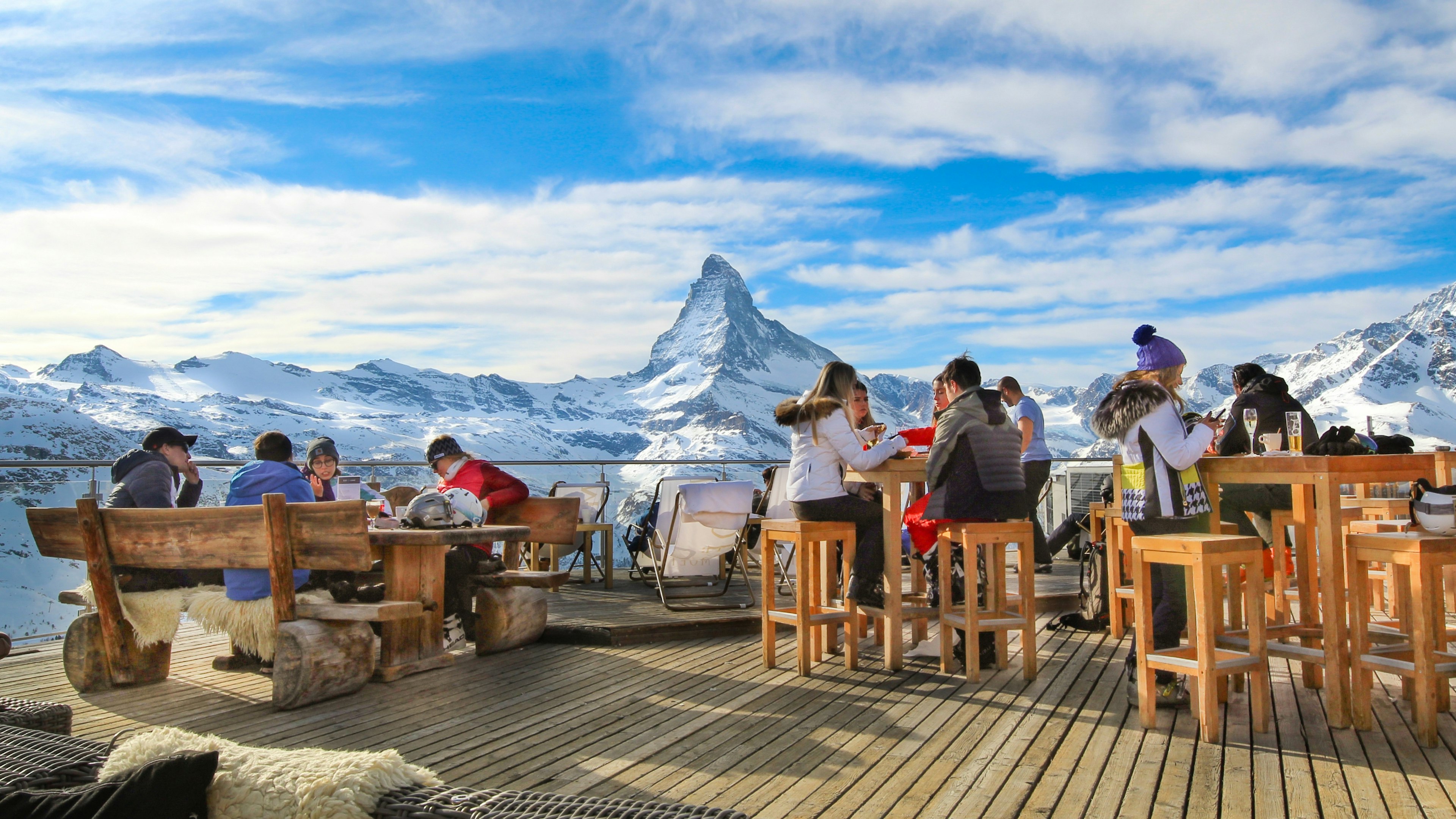 Outdoor restaurant in Zermatt, Switzerland, with the Matterhorn in the background.