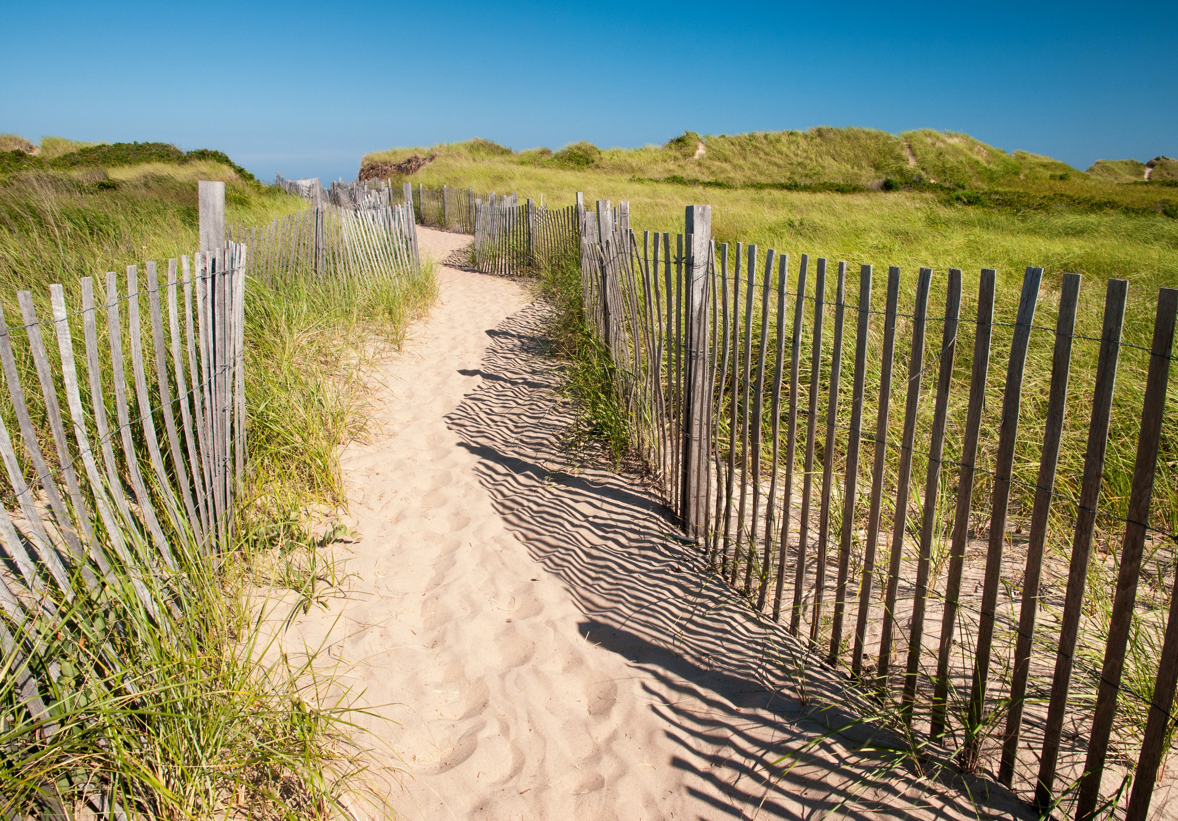 Sandy path across the dunes to Crescent Beach on Block Island, Rhode Island.