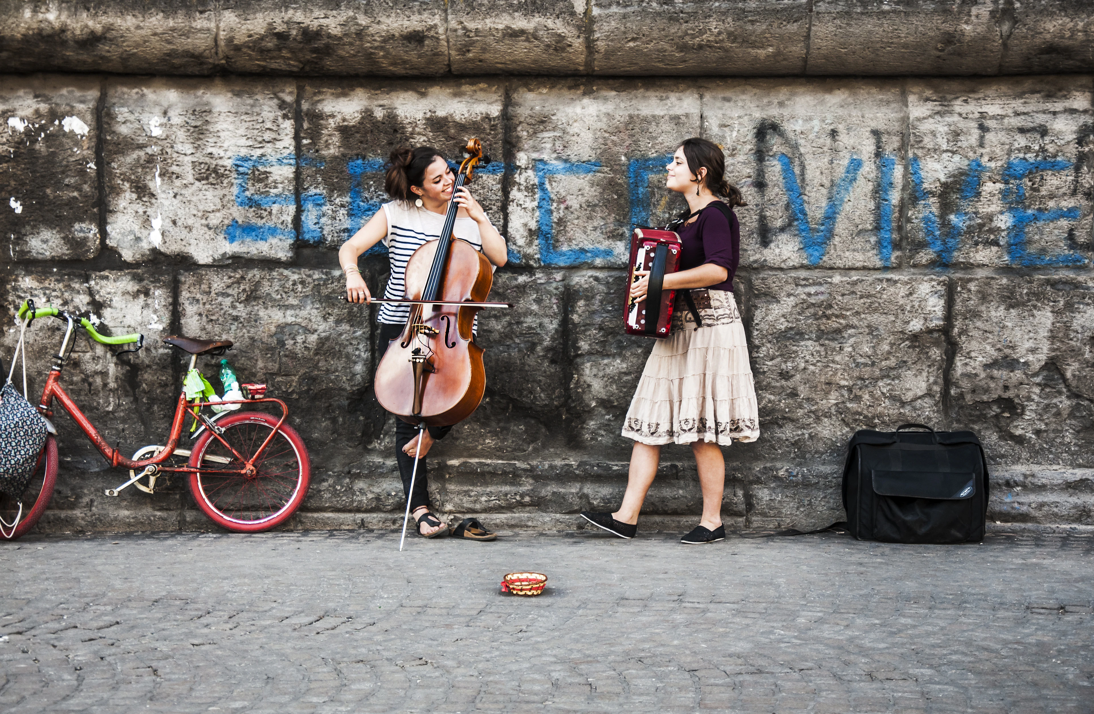 NAPLES - JUNE 17: two young musicians play music on the street in Naples, Italy.