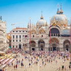 Piazza San Marco with the Basilica of Saint Mark and the bell tower of St Mark's Campanile (Campanile di San Marco) in Venice, Italy, September 09, 2015. License Type: media Download Time: 2023-07-19T12:44:28.000Z User: FergalCo Is Editorial: Yes purchase_order: