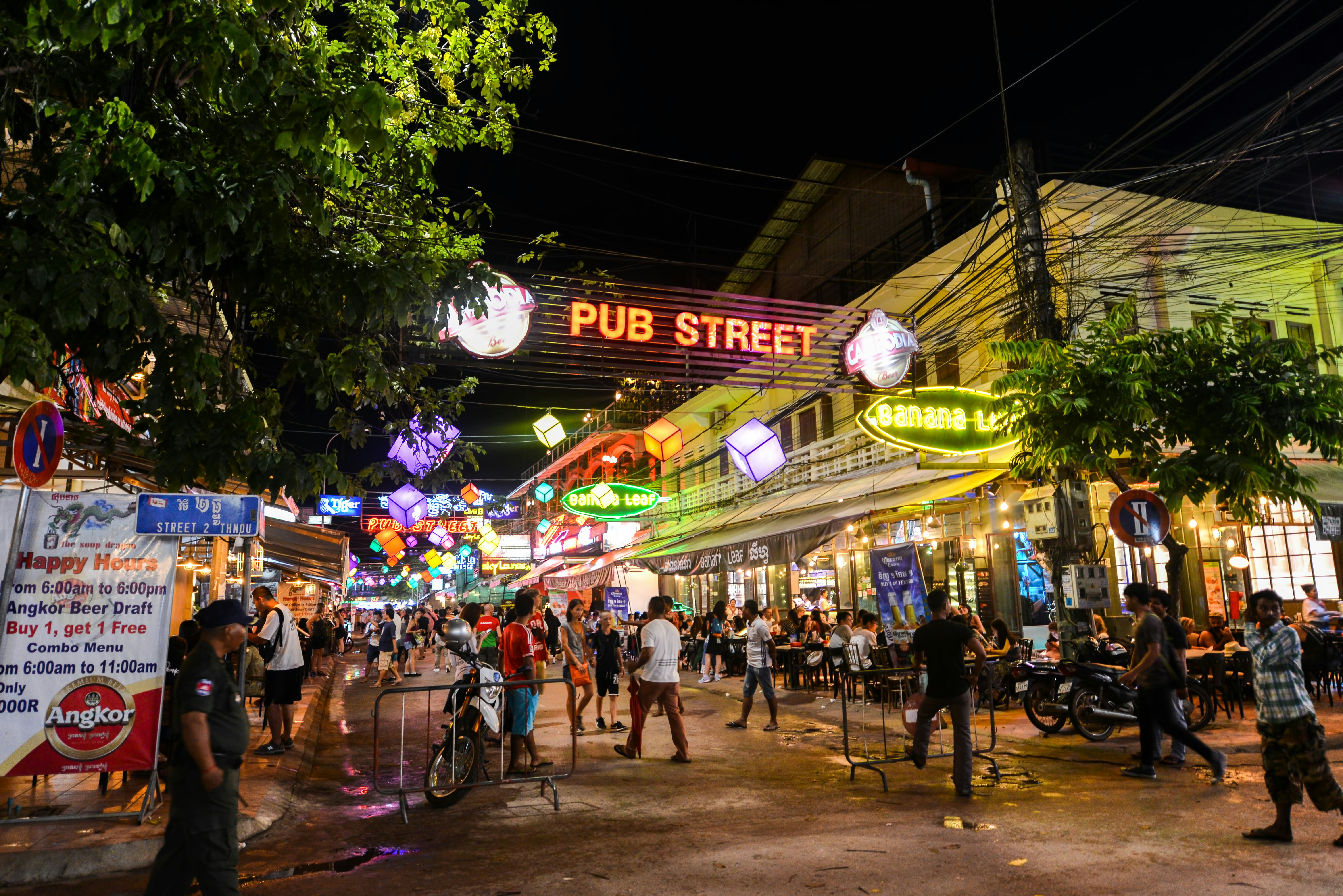 Bars, restaurants and lights along Pub Street in Siem Reap, Cambodia at night.