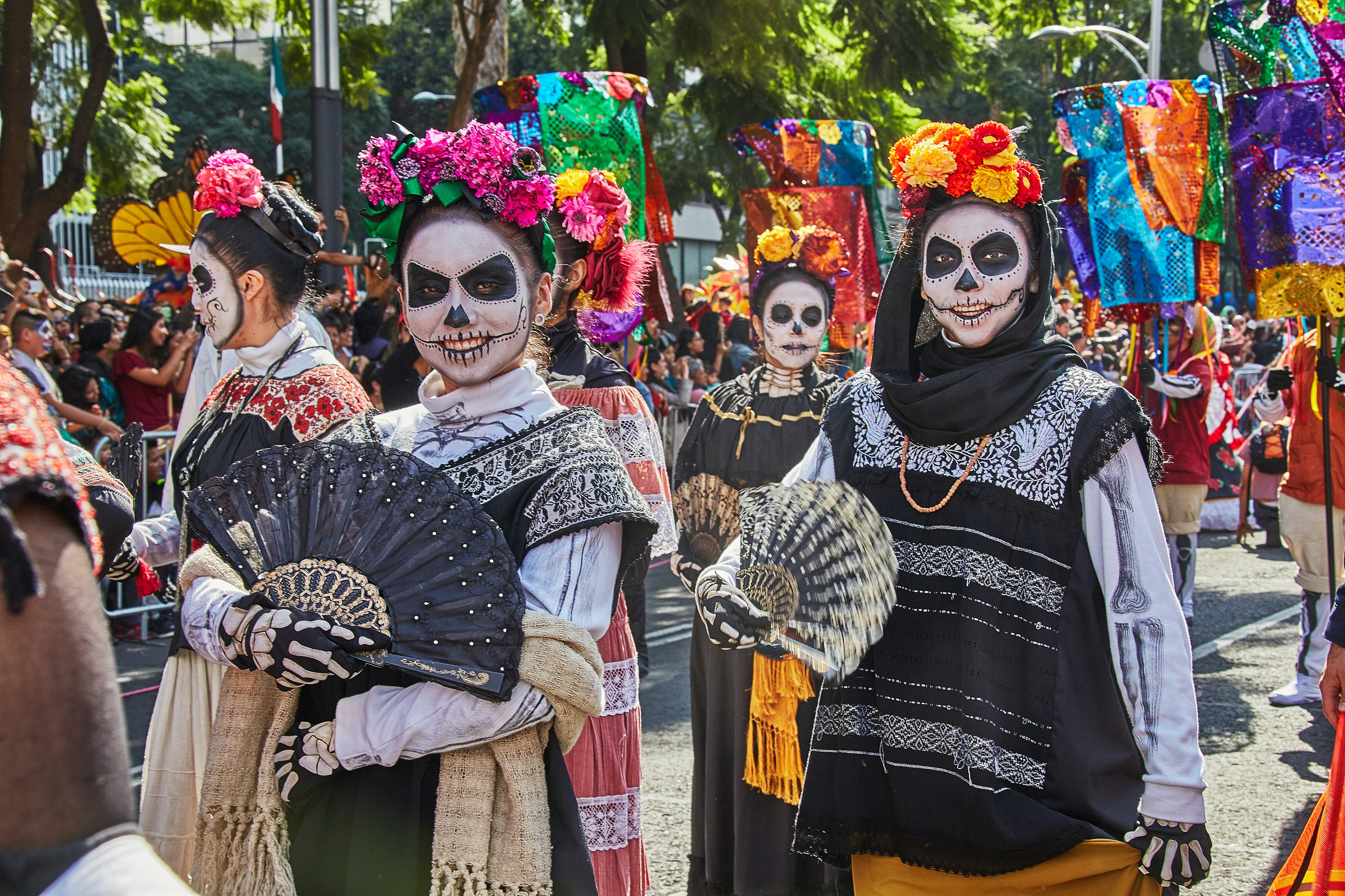 Women dressed as skeletons parade during the Day of the Dead celebrations in Mexico City.