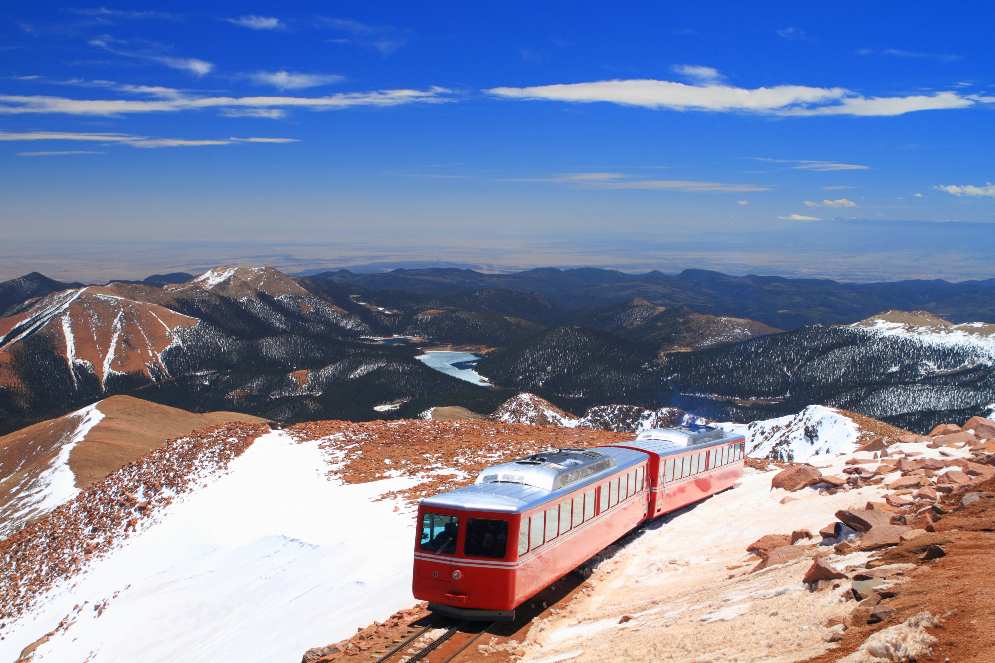 View of Pikes Peak and Manitou Springs Train on the top of Pikes Peak Mountain, Colorado, USA