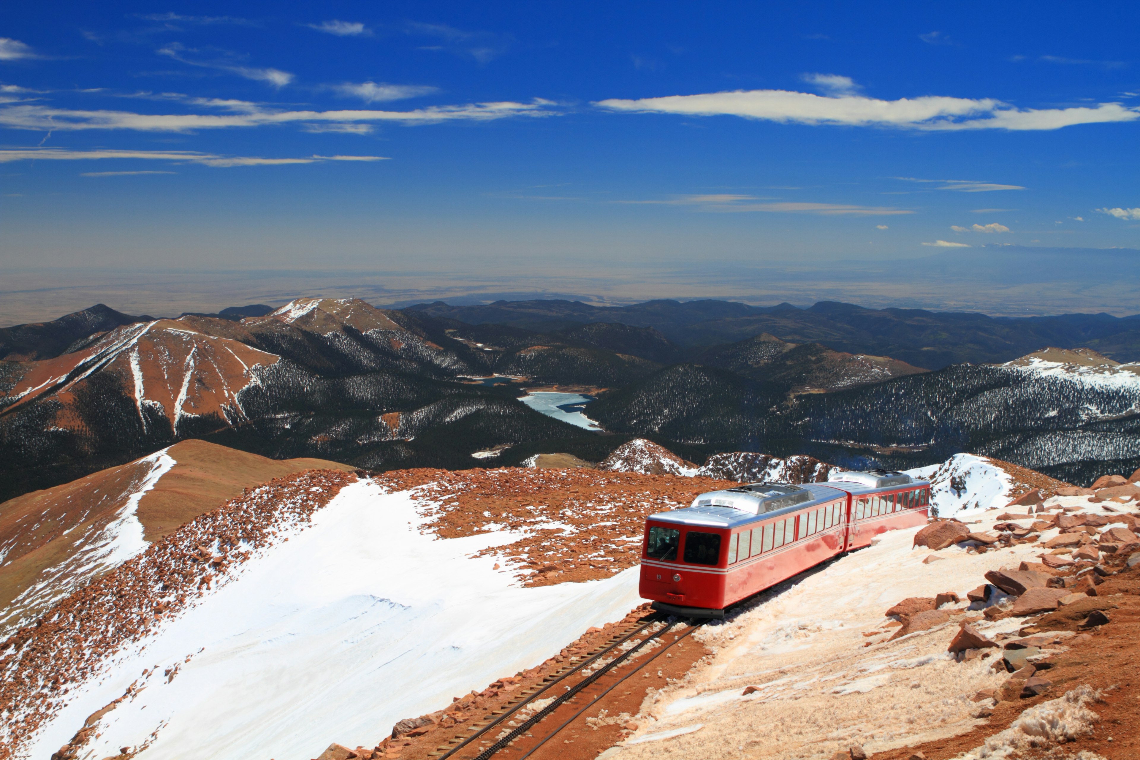 View of Pikes Peak and Manitou Springs Train on the top of Pikes Peak Mountain, Colorado, USA