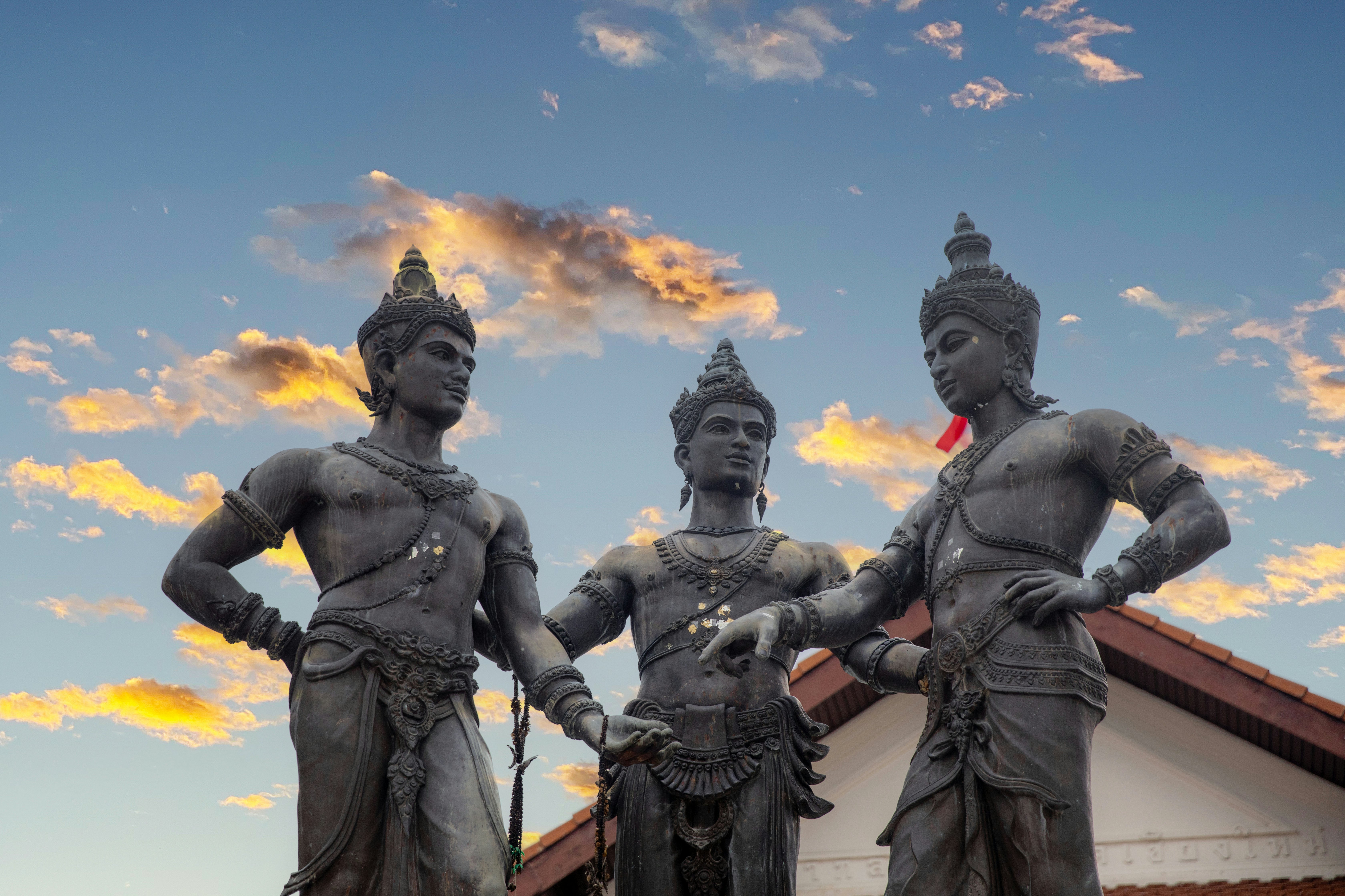 Three Kings Monument viewed from below with bright clouds and sky above