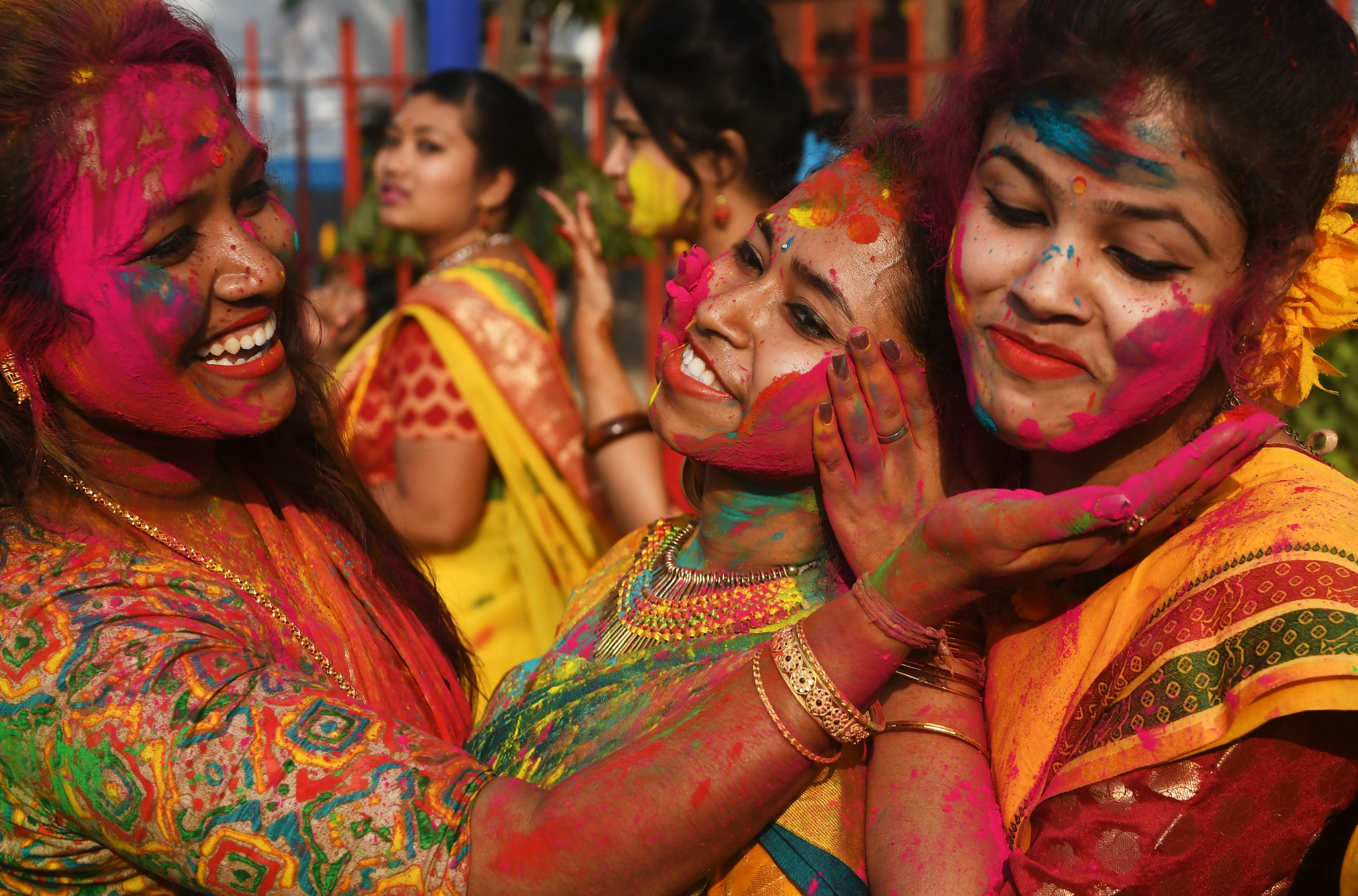 Women celebrate Holi, the Hindu Festival of Colors, in Rajasthan.