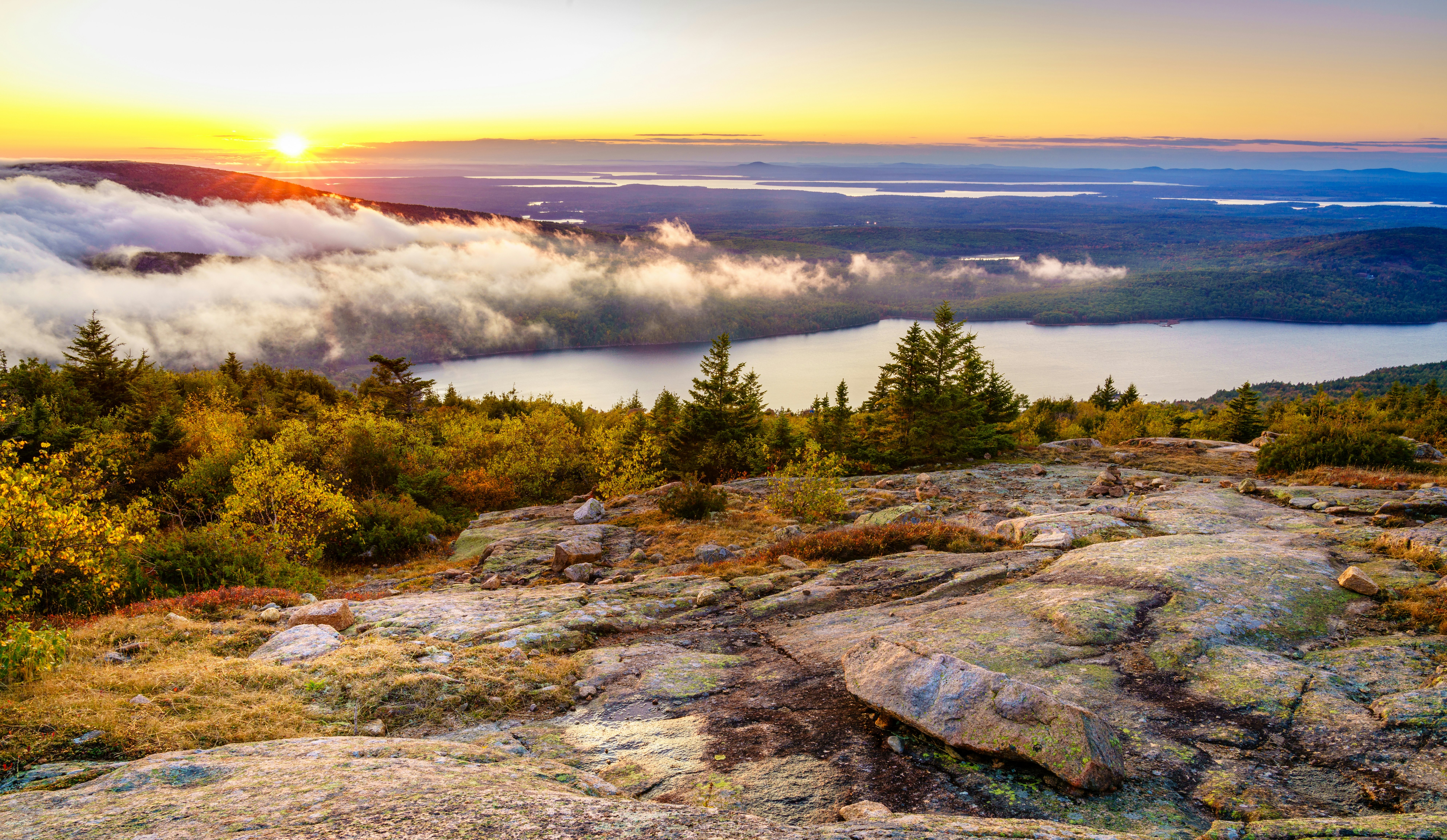 Scenic sunset in Acadia National Park as seen from the top of Cadillac Mountain.