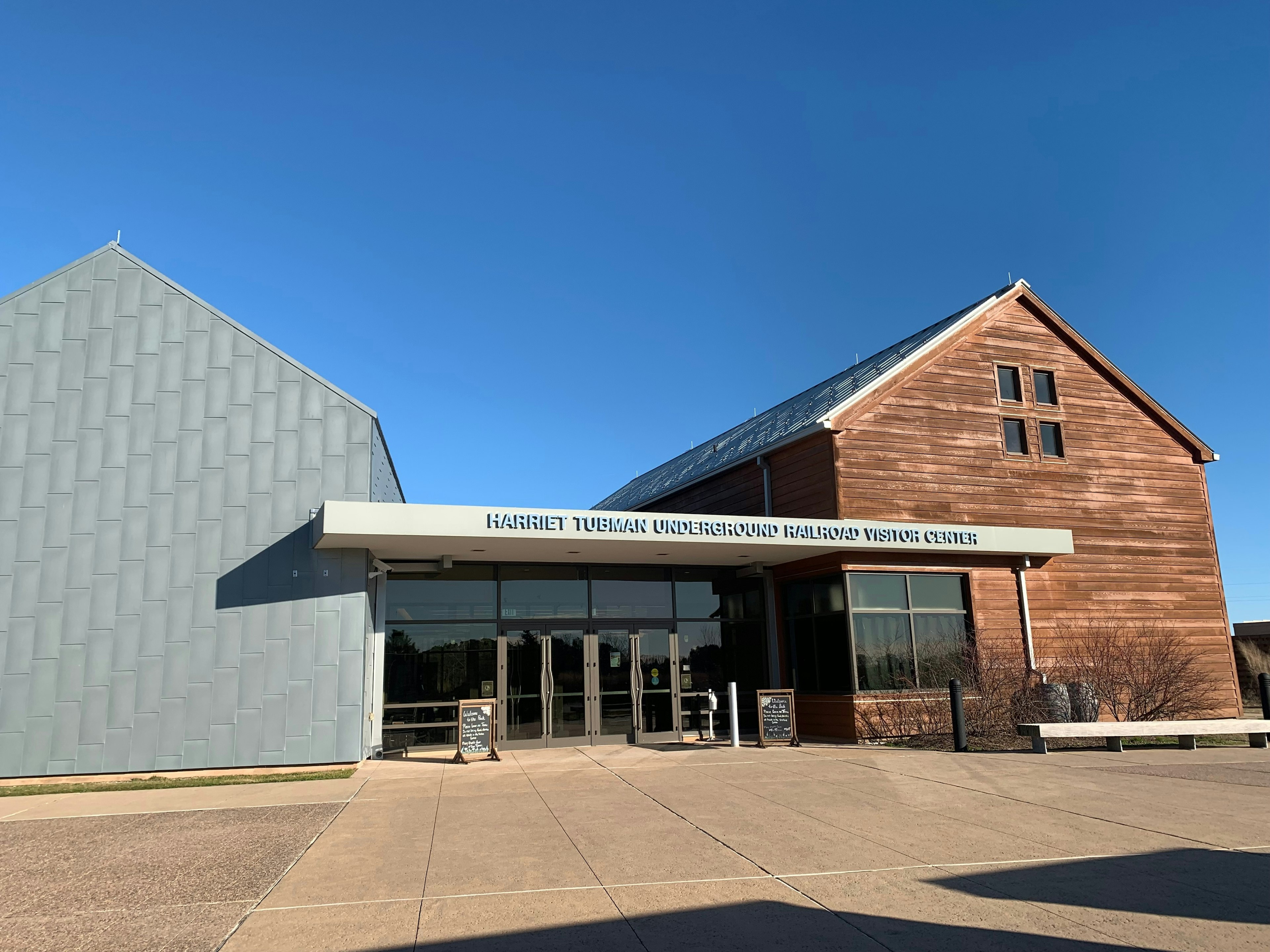 The exterior of a visitor center with a sign saying "Harriet Tubman Underground Railroad Visitor Center"