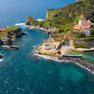 Aerial view of the Gaiola beach and island located in the Posillipo district, in Naples, Italy. The area is part of Underwater Park of Gaiola, a protected marine reserve and overlooks Tyrrhenian Sea.; Shutterstock ID 2291173695; purchase_order:65050 - Digital Destinations and Articles; job:Online Editorial; client:Naples best beaches; other:Tasmin Waby
2291173695