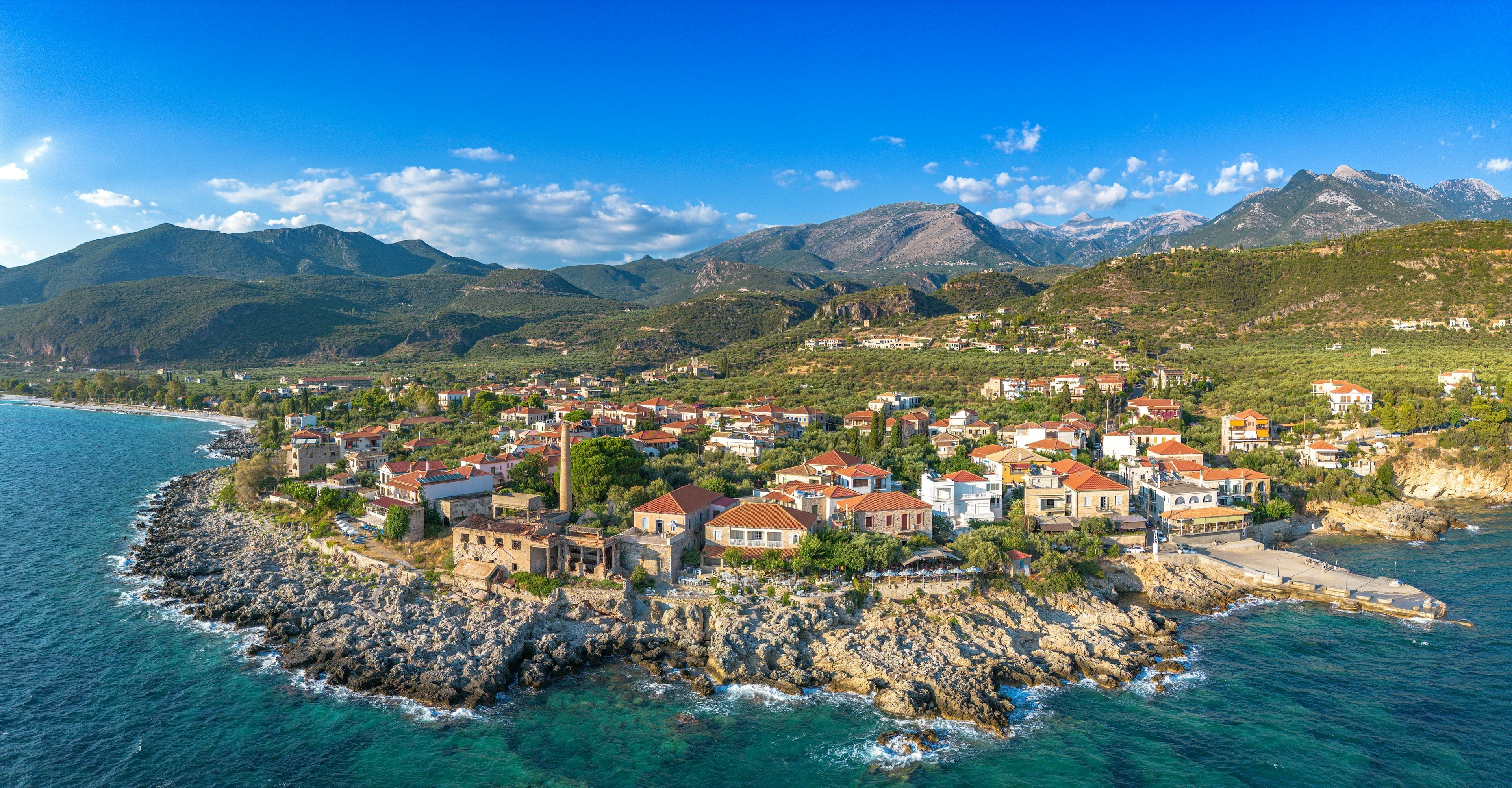 Aerial view of the wonderful seaside village of Kardamyli, with mountains in the background.