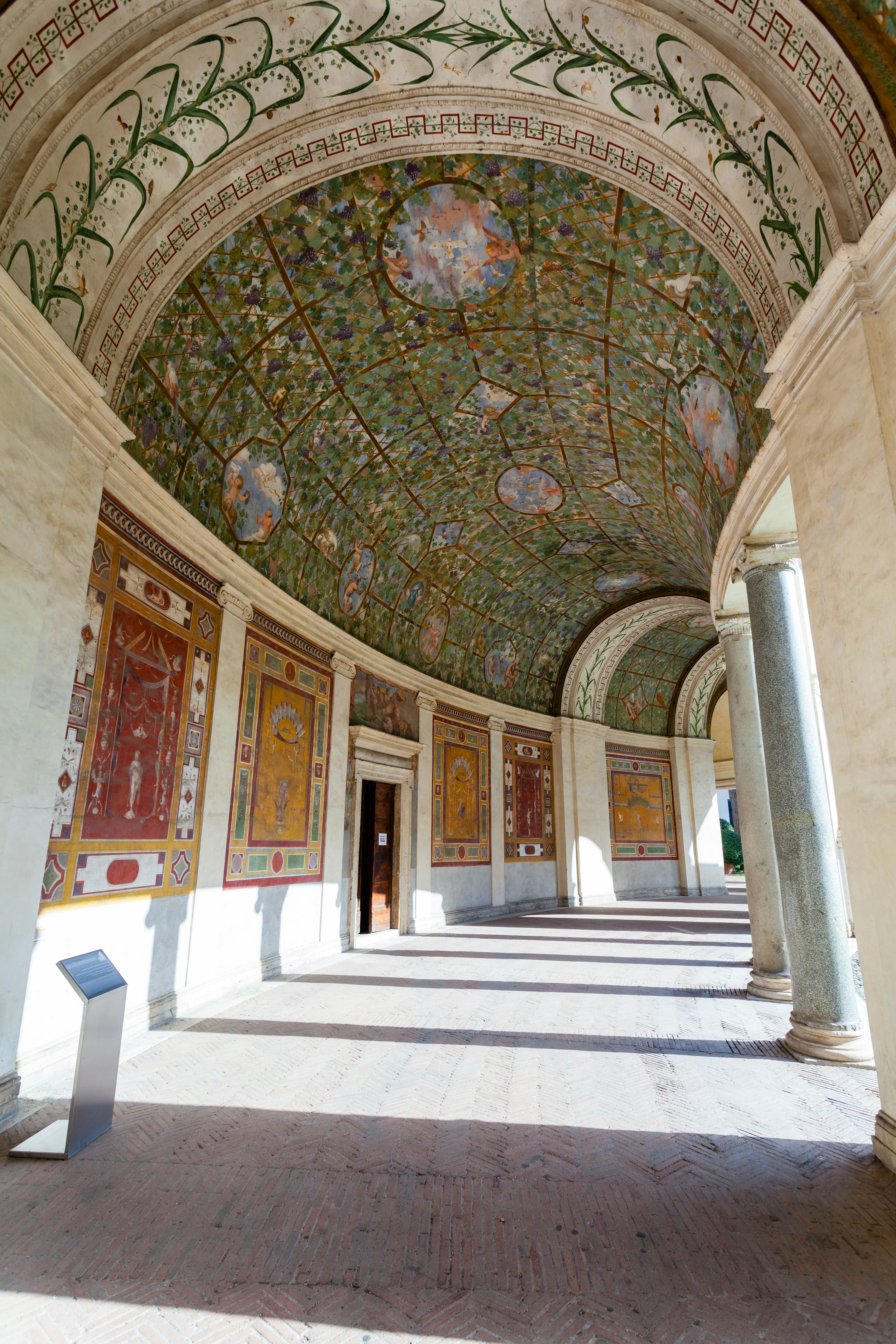 ROME, ITALY - NOVEMBER 1, 2016: arcade of Villa Giulia, houses Museo Nazionale Etrusco (National Etruscan Museum), big collection of Etruscan art and artifacts, in Villa Borghese gardens in Rome city,