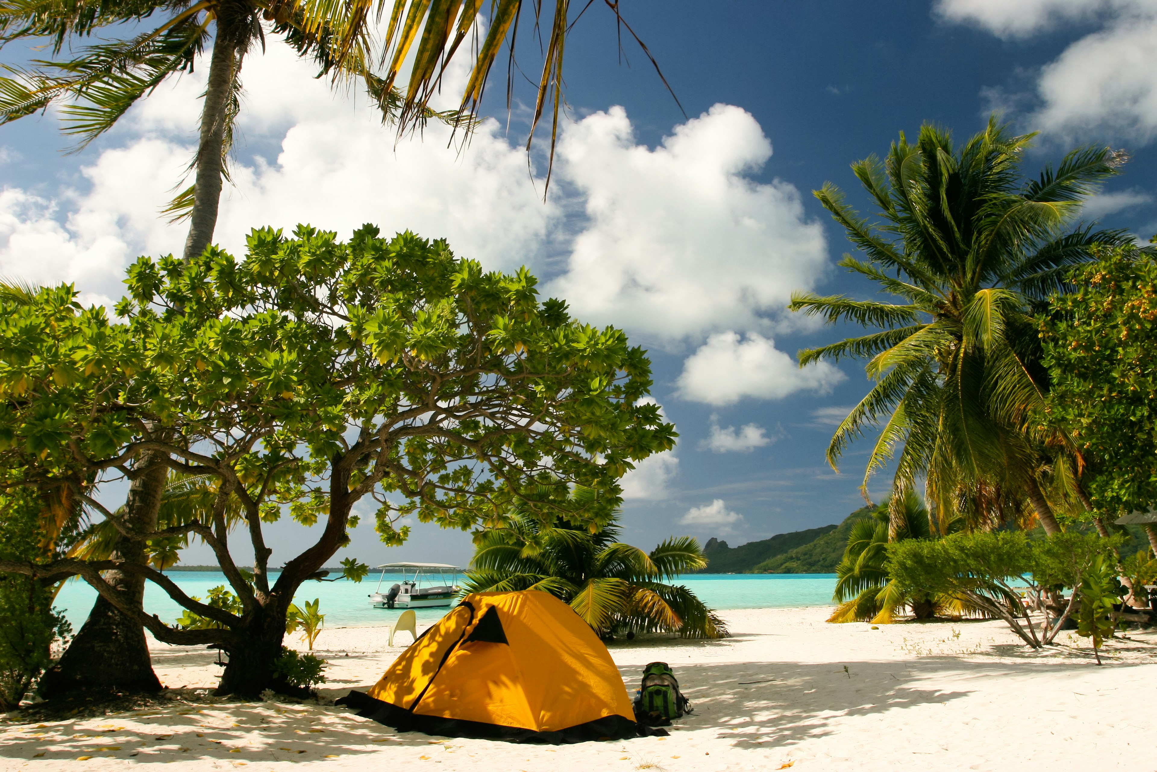 Camp on the paradise tropical beach, Maupiti, French Polynesia.