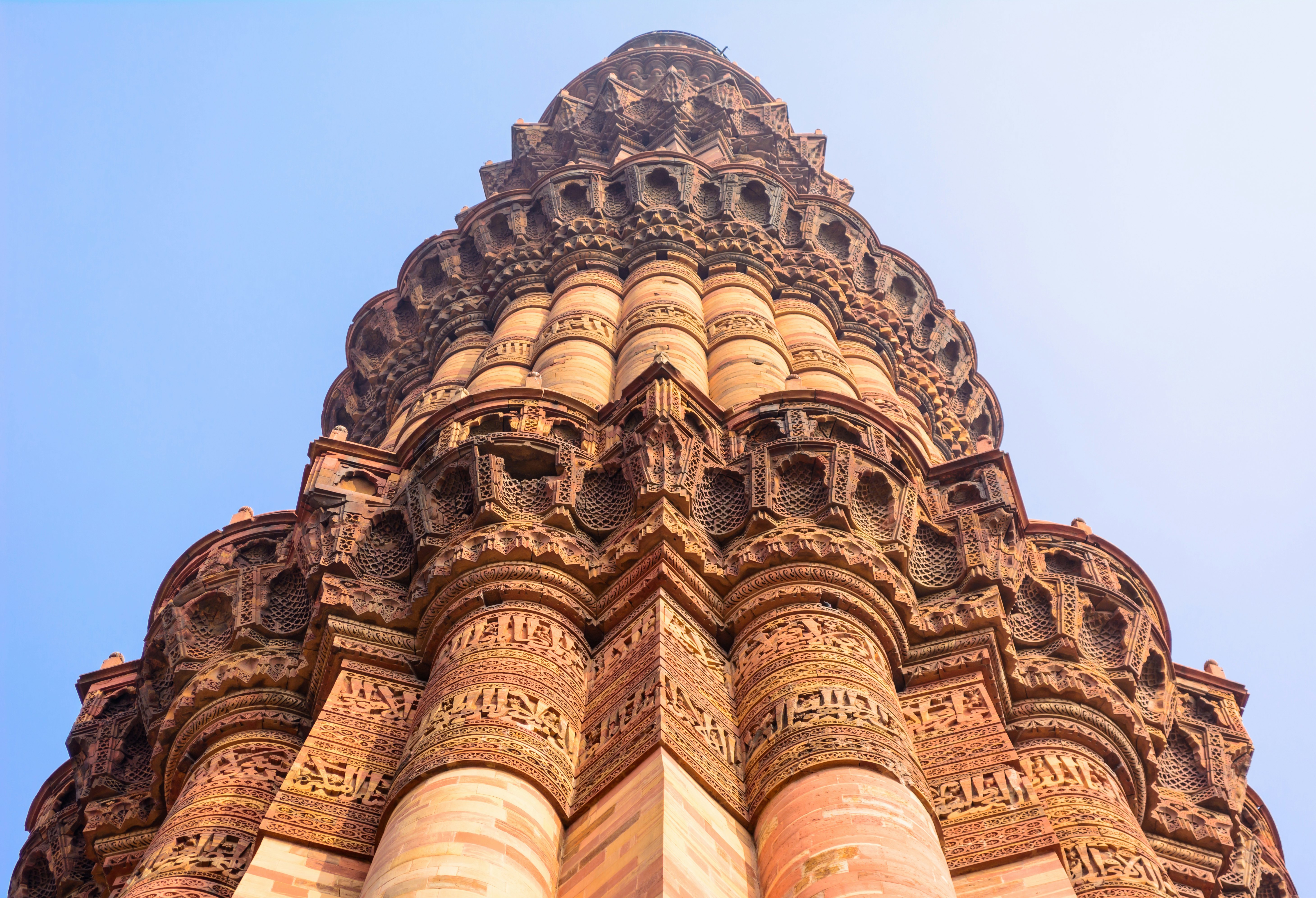 Intricate carvings adorn the towering Qutb Minar, the tallest free-standing stone tower in the world.