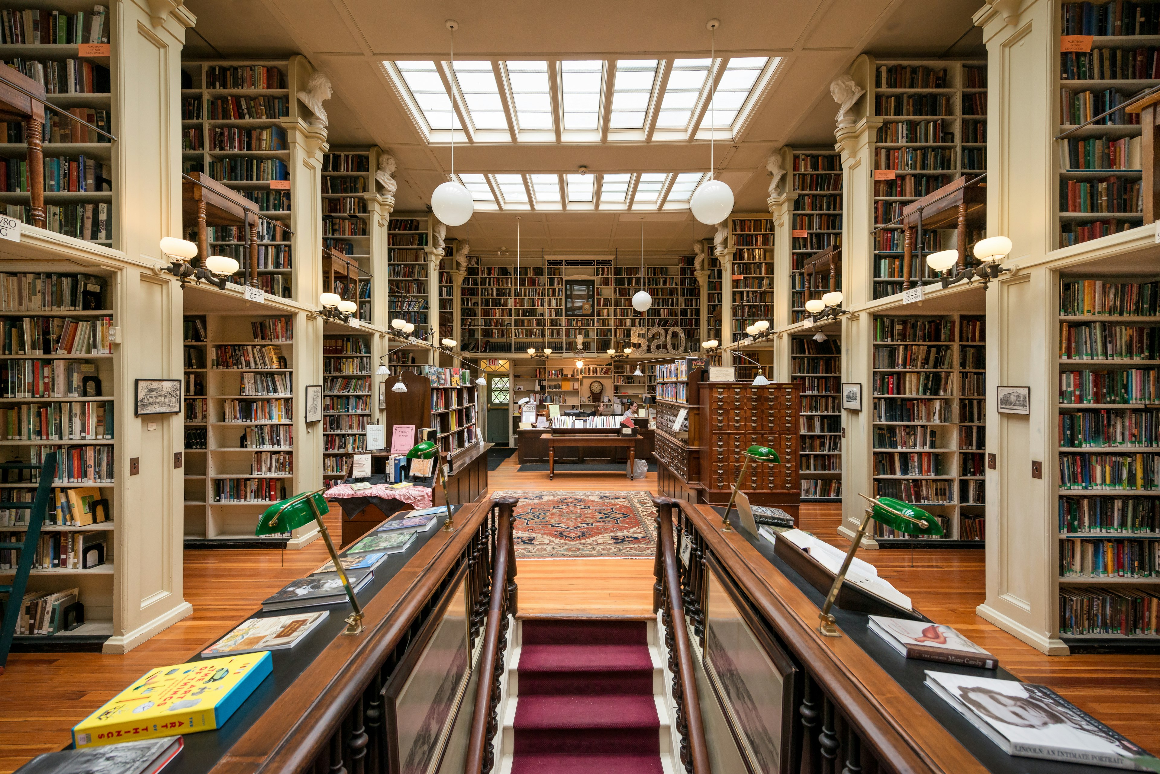 Bookshelves inside the historic Athenaeum library in Providence, Rhode Island.