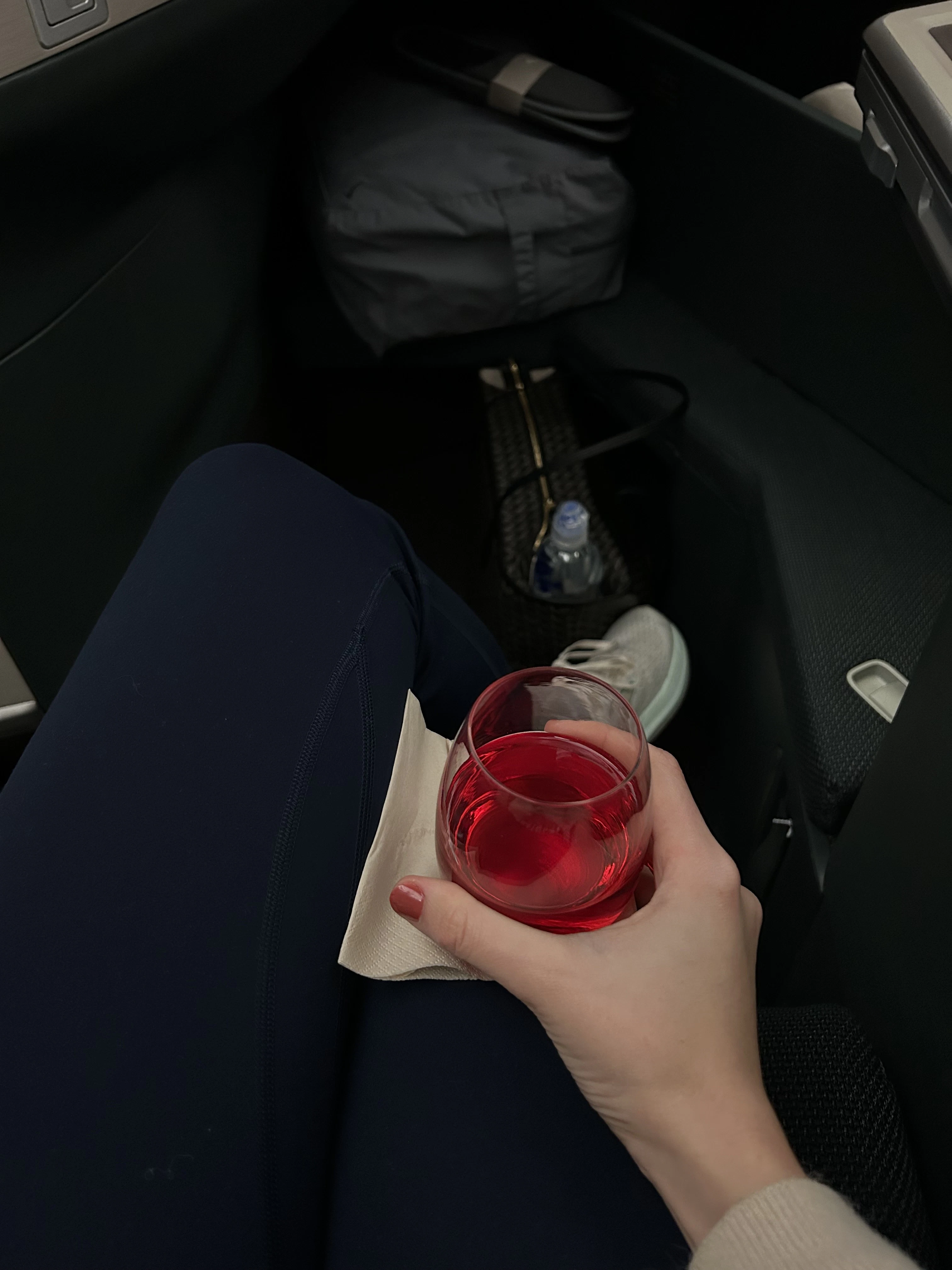 having a drink on the plane