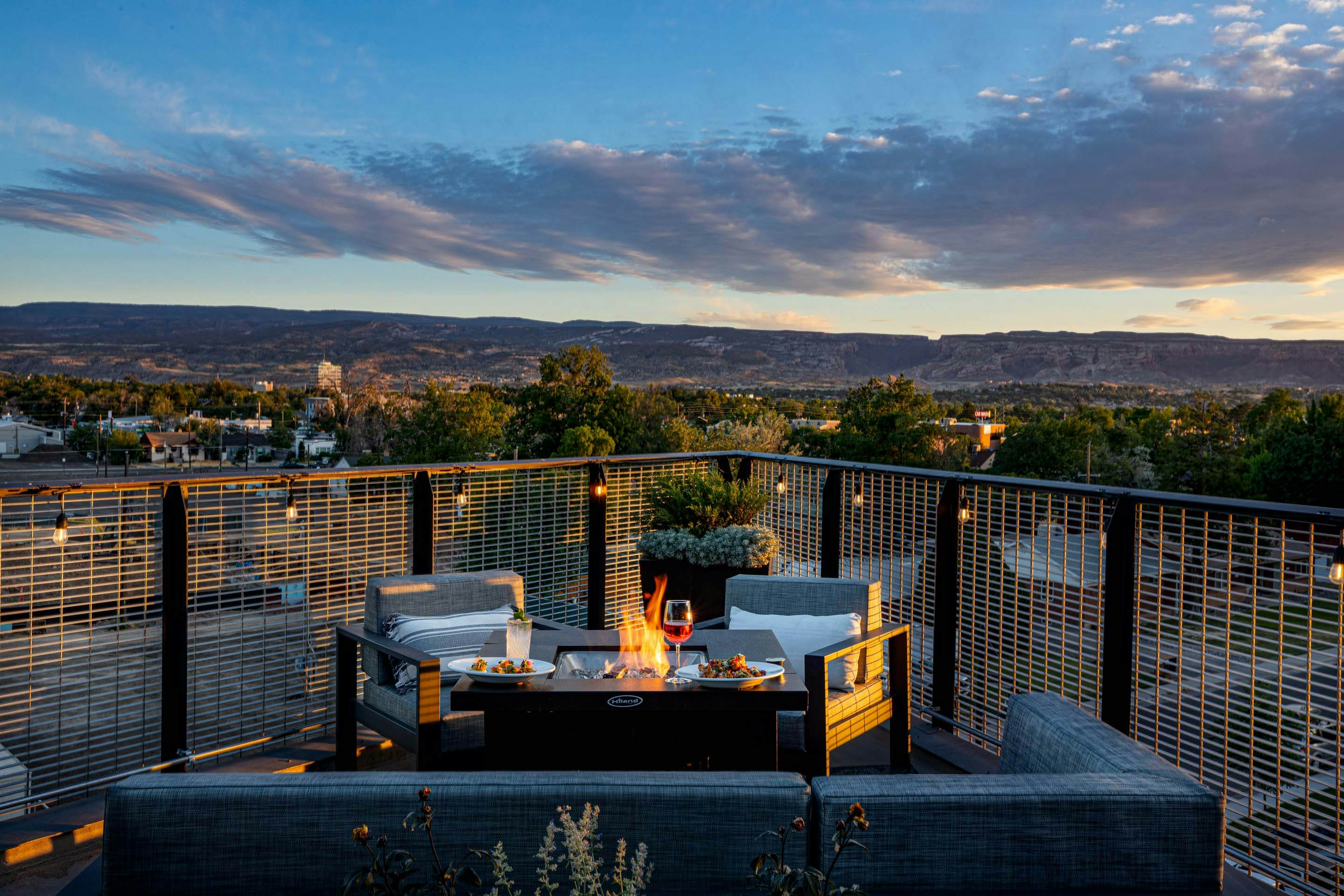 Patio fire pit with a mesa in the distance in Grand Junction, Colorado