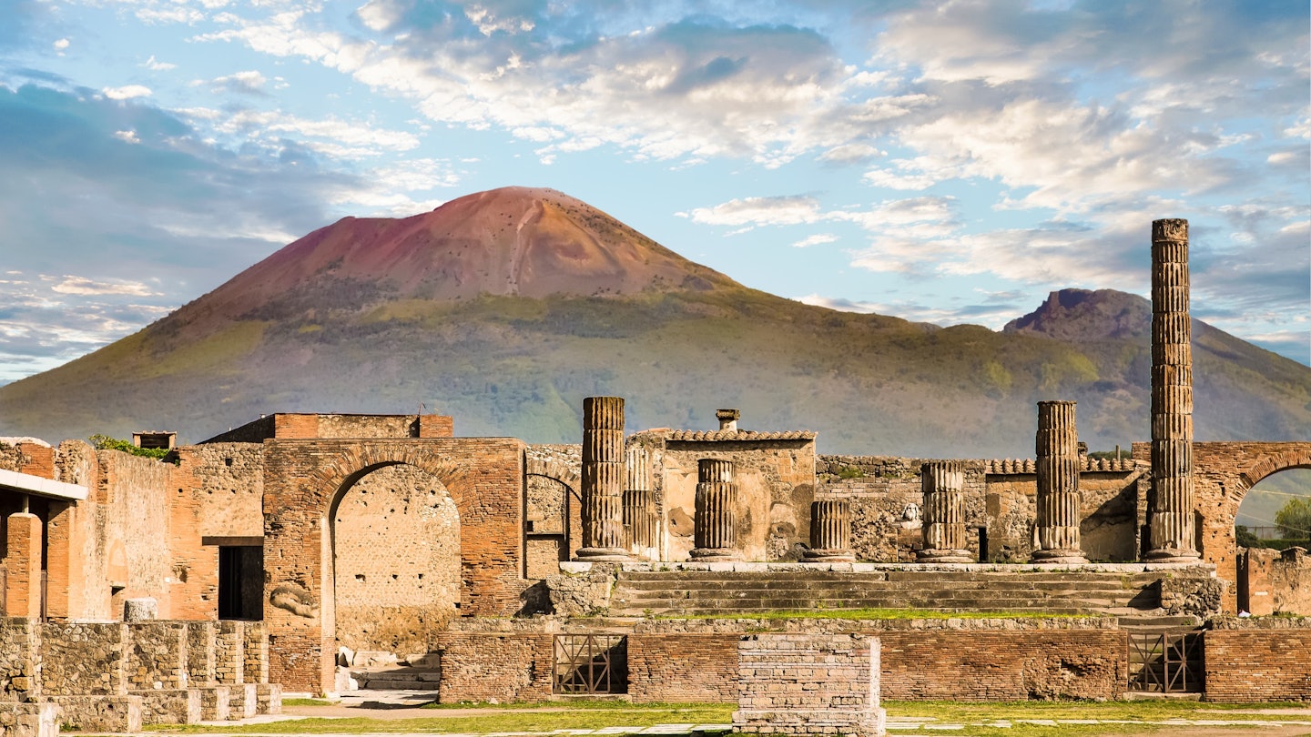 1058157586
Ancient walls in Pompeii with volcano Vesuvius in the background
Vesuvius and Pompeii - stock photo
Ancient walls in Pompeii with volcano Vesuvius in the background