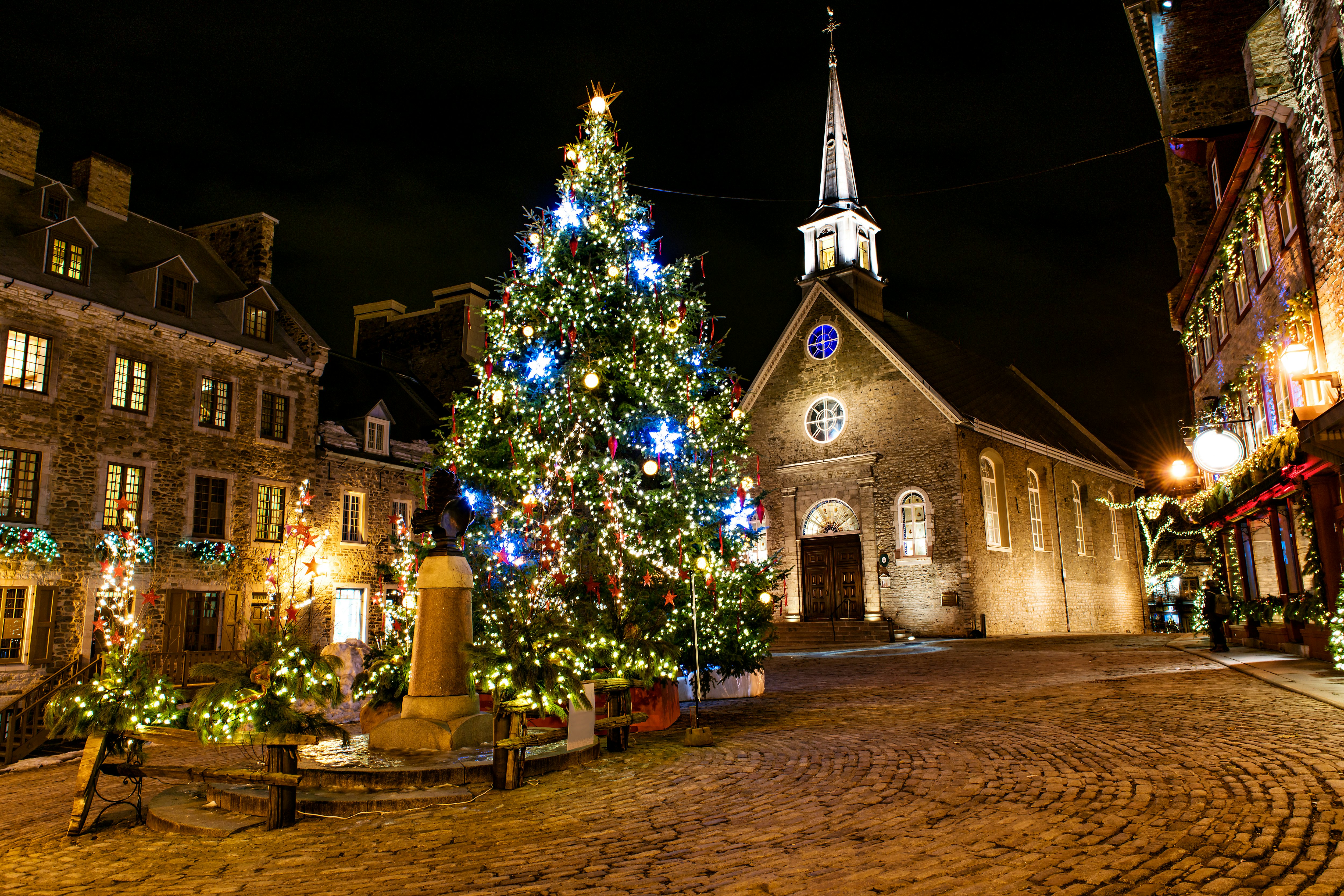 A Christmas tree lights up Petit Champlain in Quebec City, Canada.