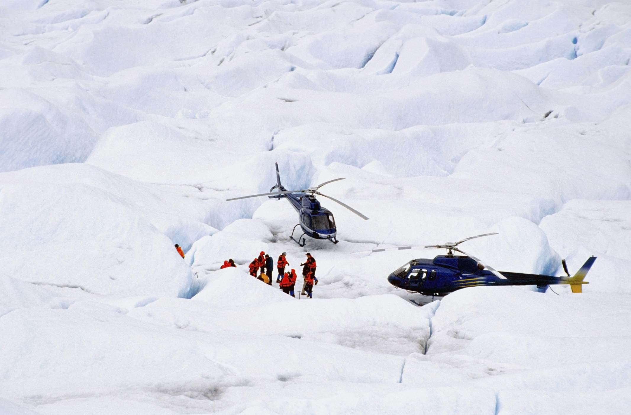 Helicopters drop tourists on the Juneau Icefield near Juneau, Alaska.