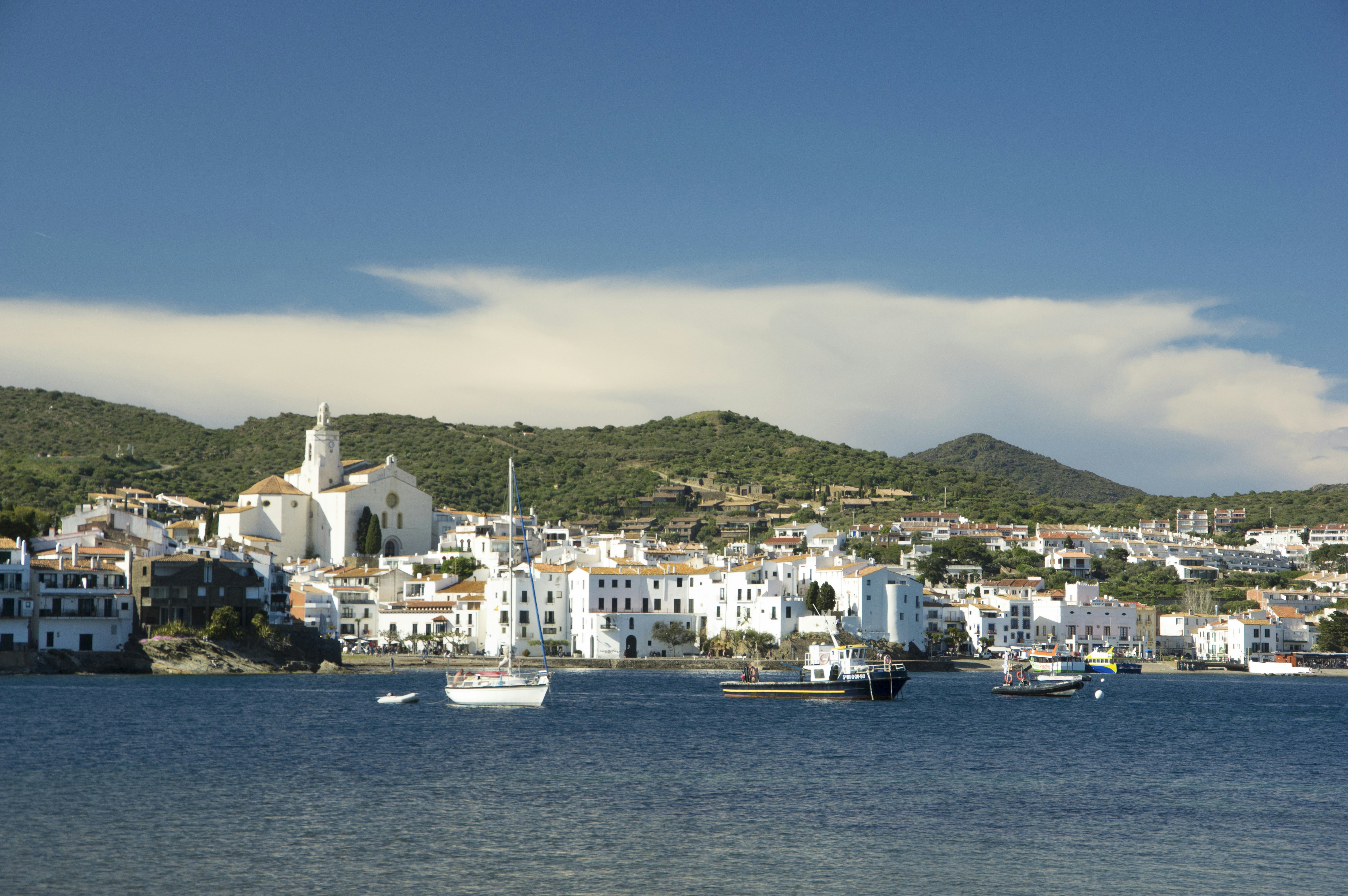 View of Cadaqués from the sea Cadaqués is a town in the Alt Empordà comarca, in the province of Girona, Catalonia, Spain.