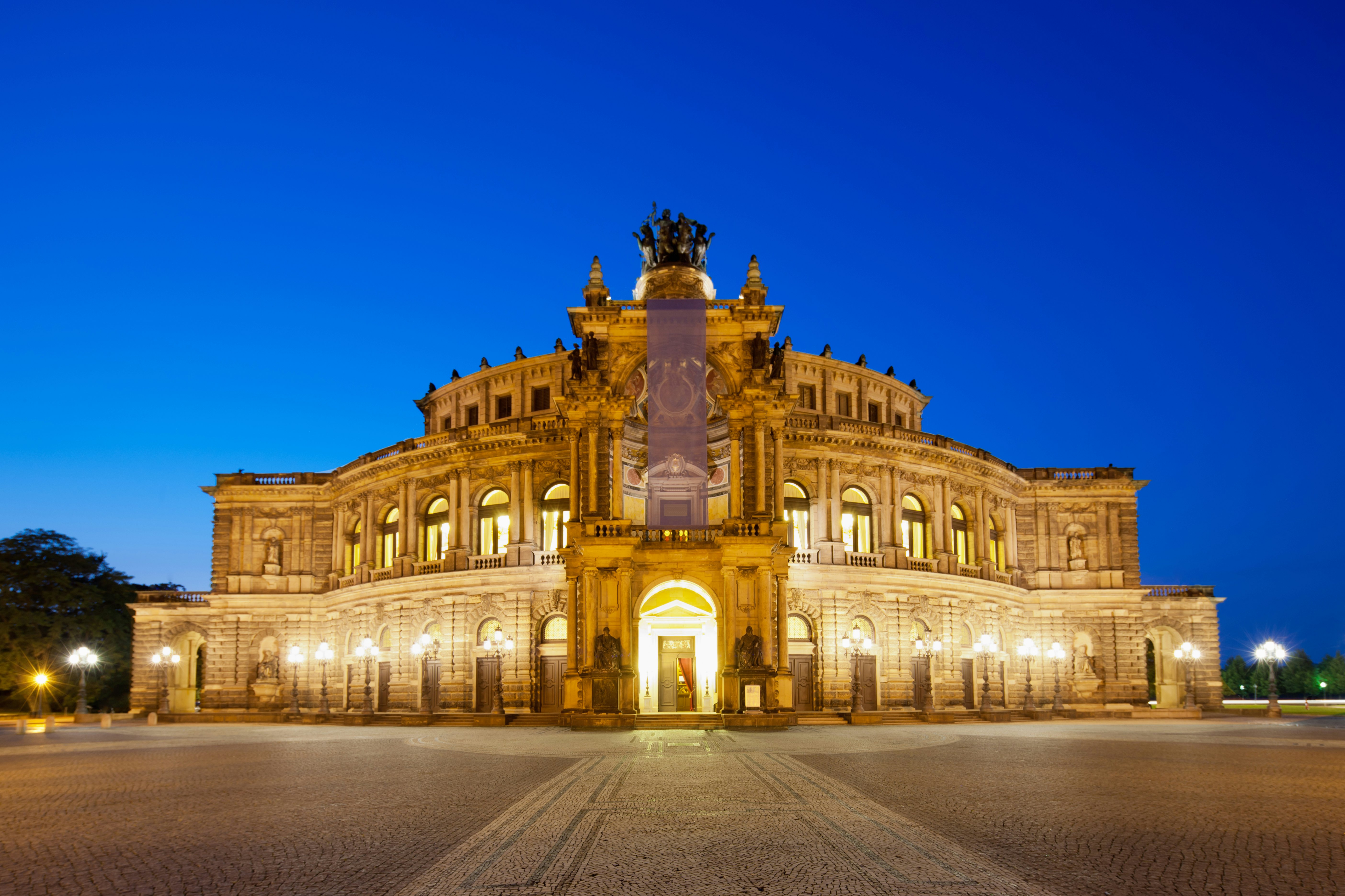 Nighttime view of the Semperoper Opera House in Dresden, Germany.