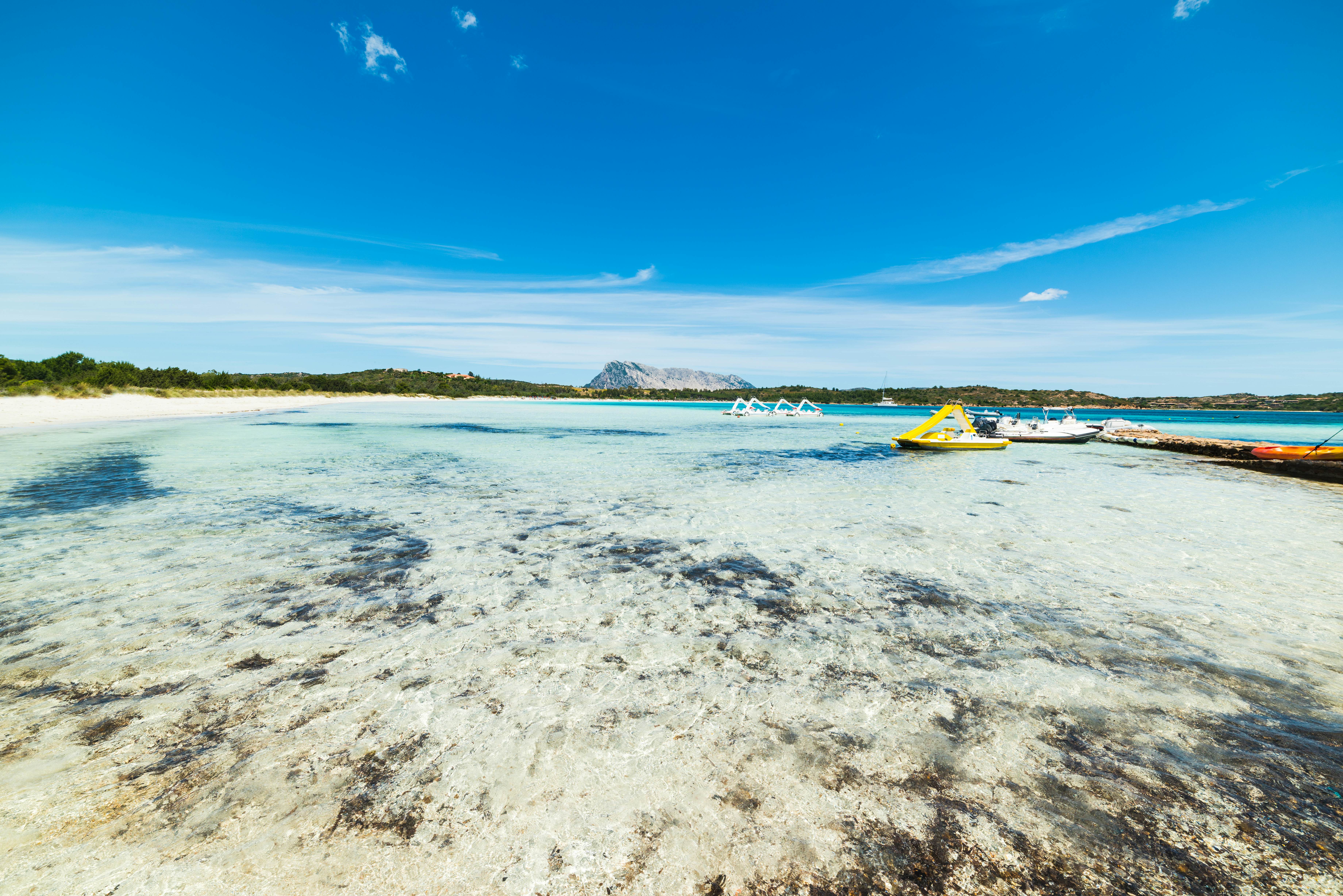 Shallow clear waters of a sandy bay