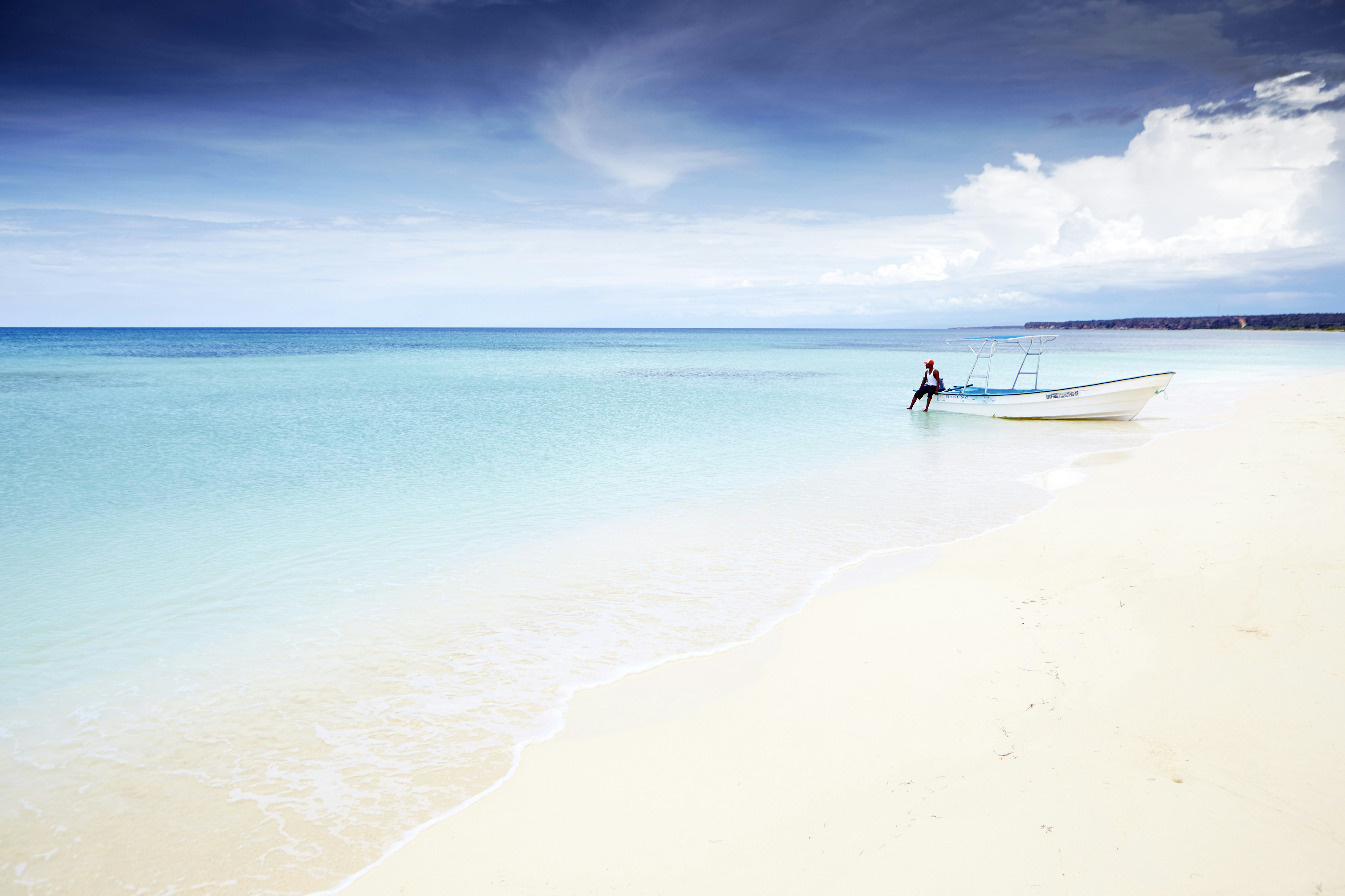 Boat on white sand beach of Bahía de las Águilas.
Lonely Planet Traveller Magazine, Issue 95, November, Great Escape, Dominican Republic