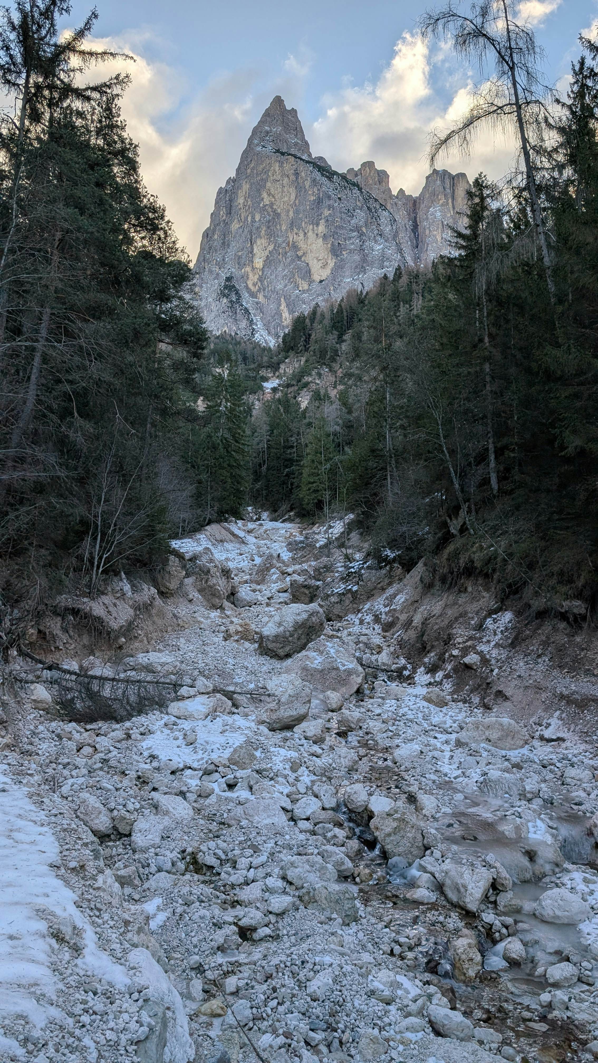 A view up a valley towards Mt Sciliar in the Dolomites, Italy