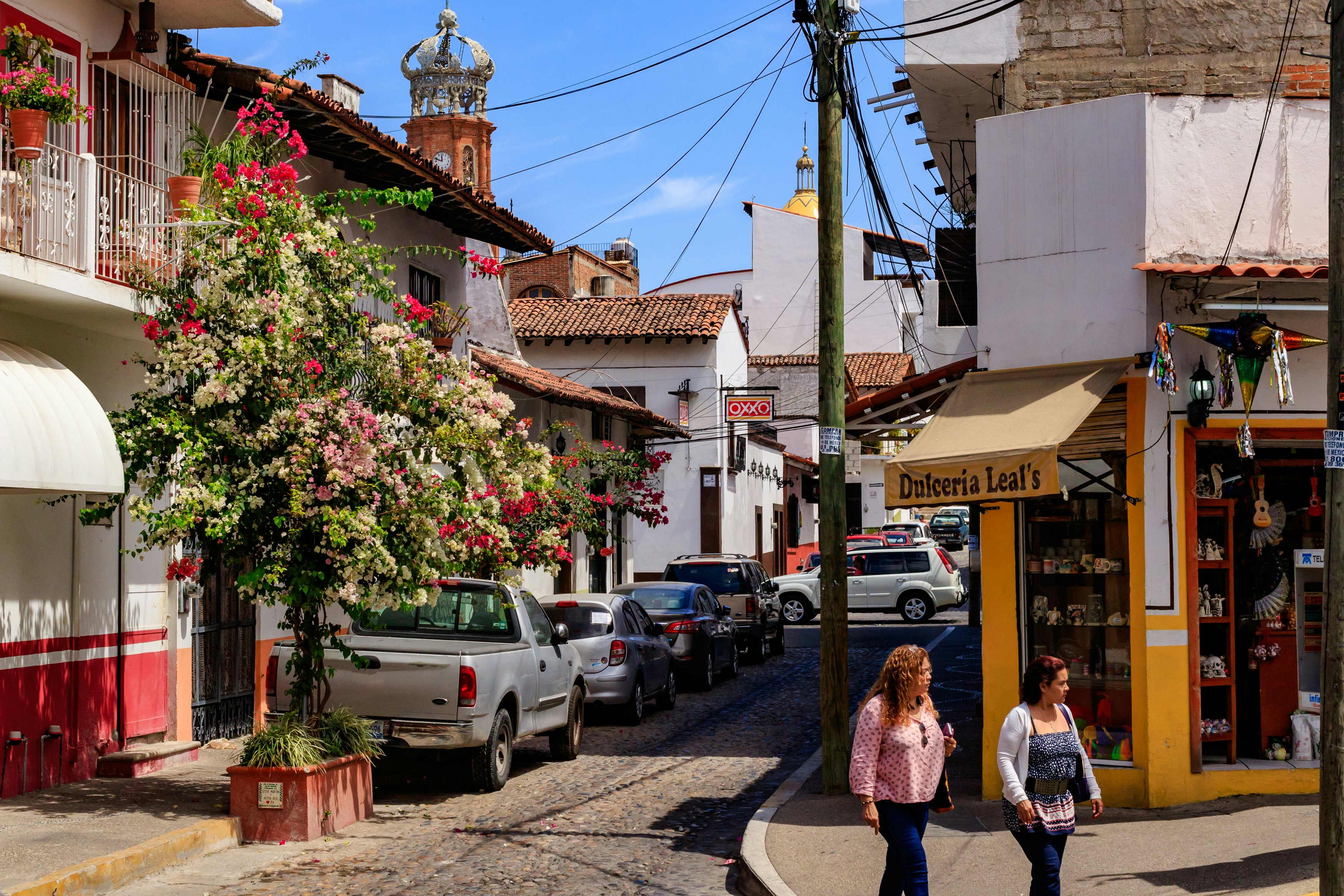 Two women walk along in Puerto Vallarta's city center.