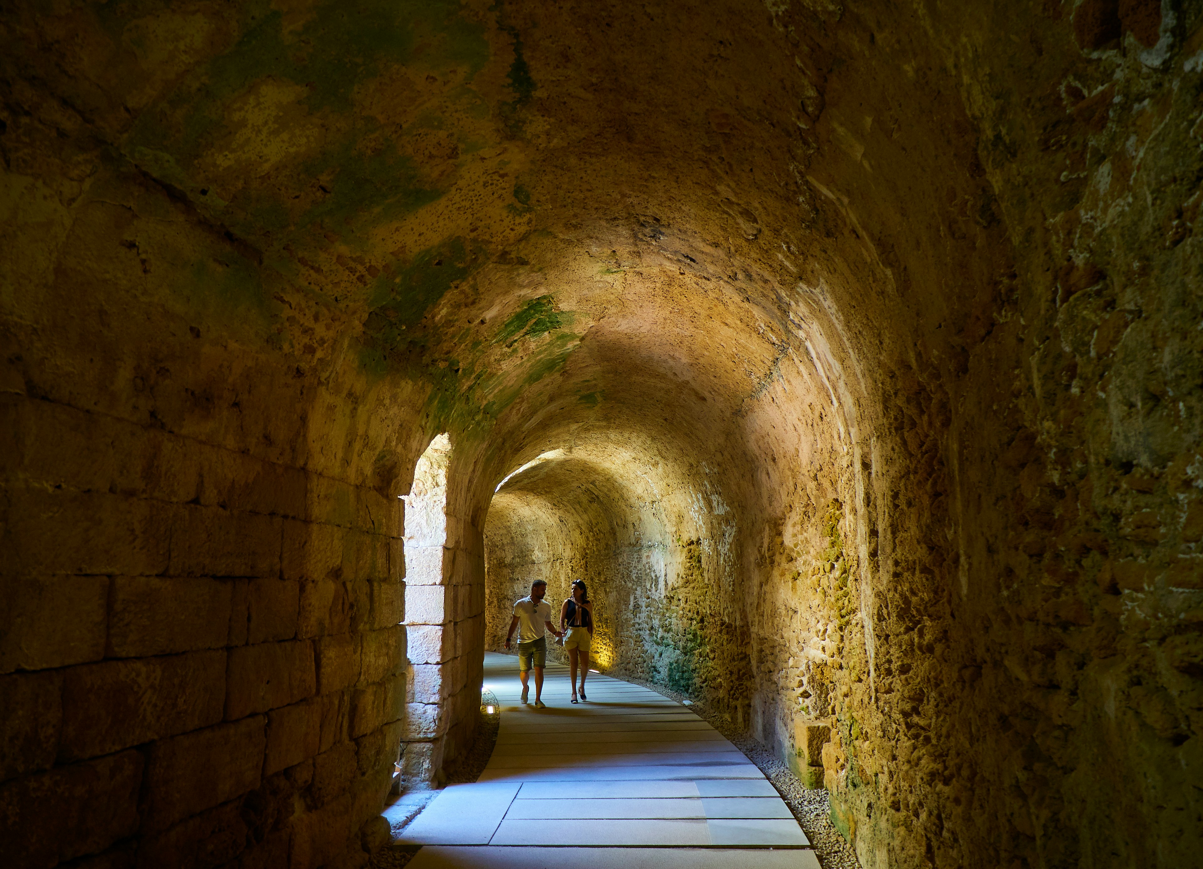 A gallery of the Roman theater hidden below the streets of Cadiz.