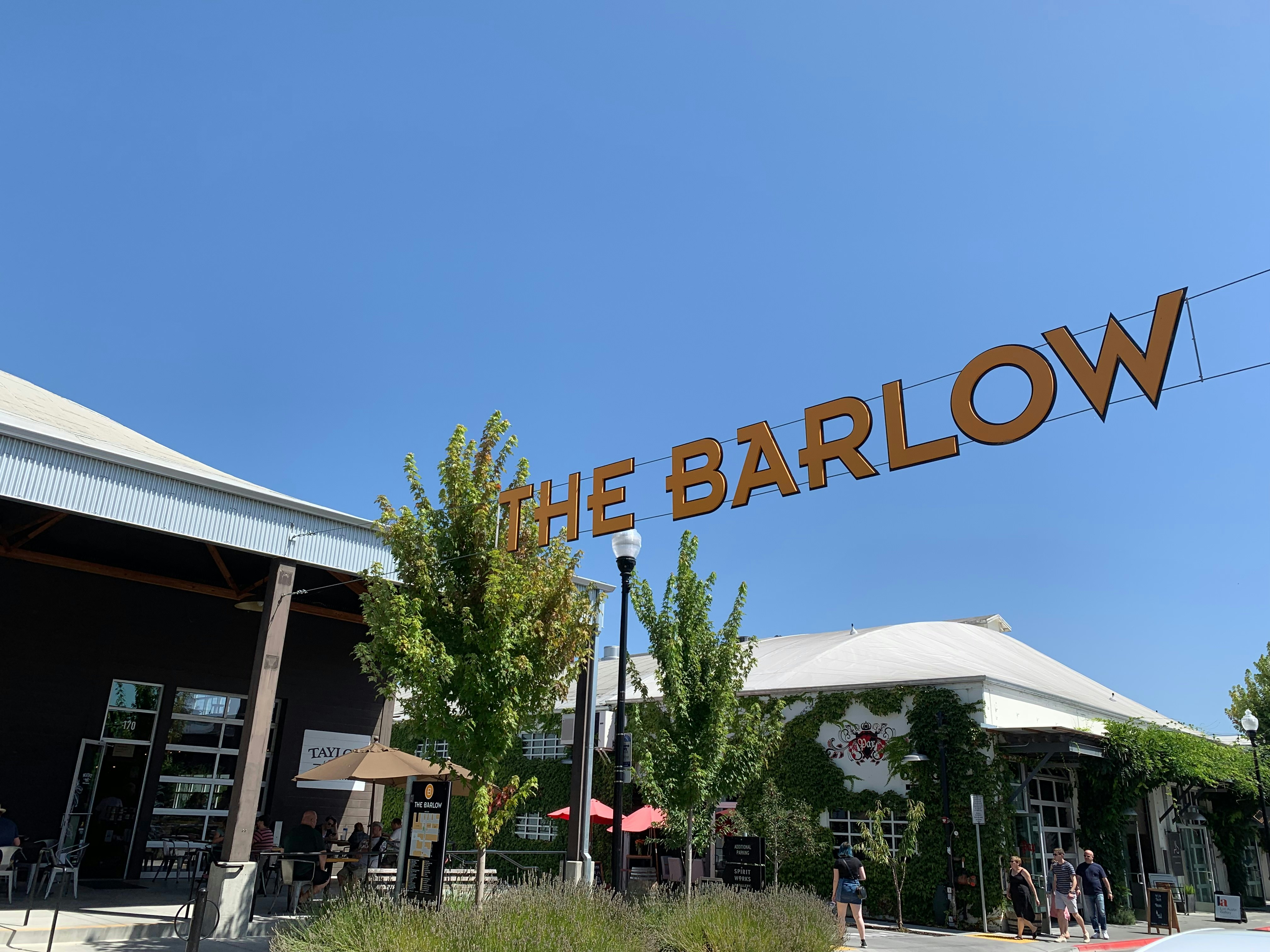 a large street sign over the Barlow market area in Sebastopol