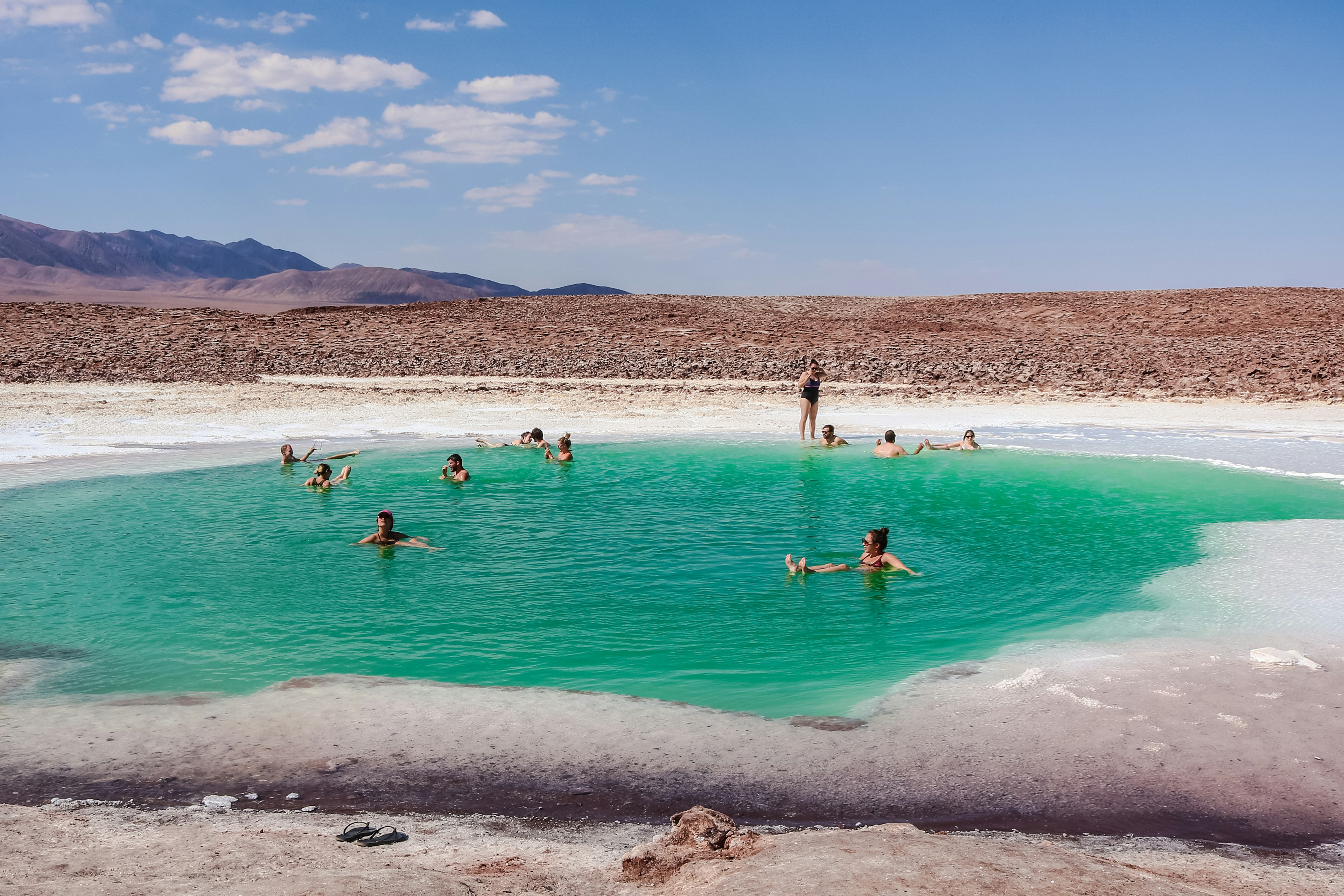 People Floating at Lagunas Escondidas de Baltinache in Atacama, Chile.