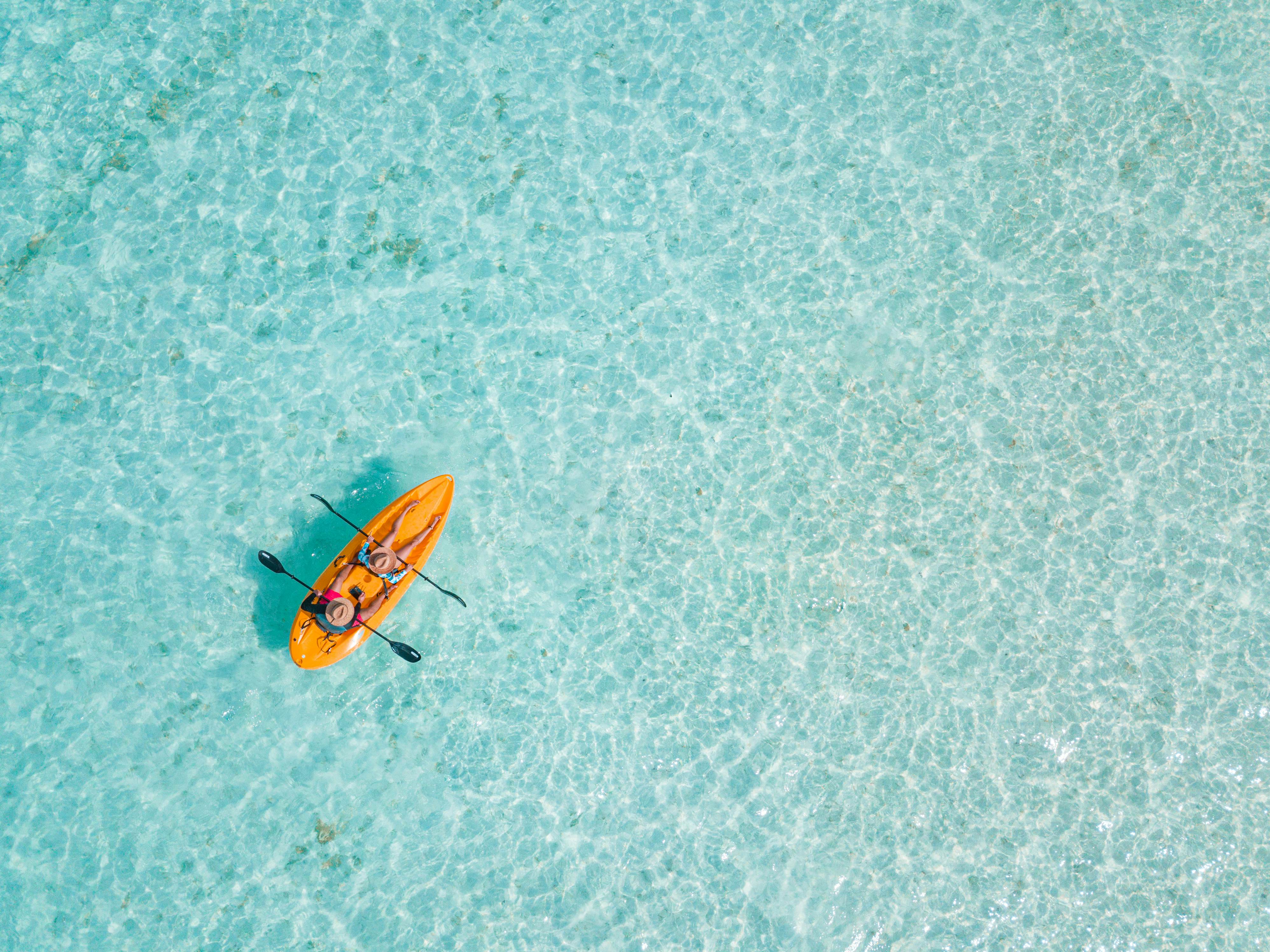 Couple navigating in kayak the Bacalar Lagoon, near Cancun in Riviera Maya, Mexico