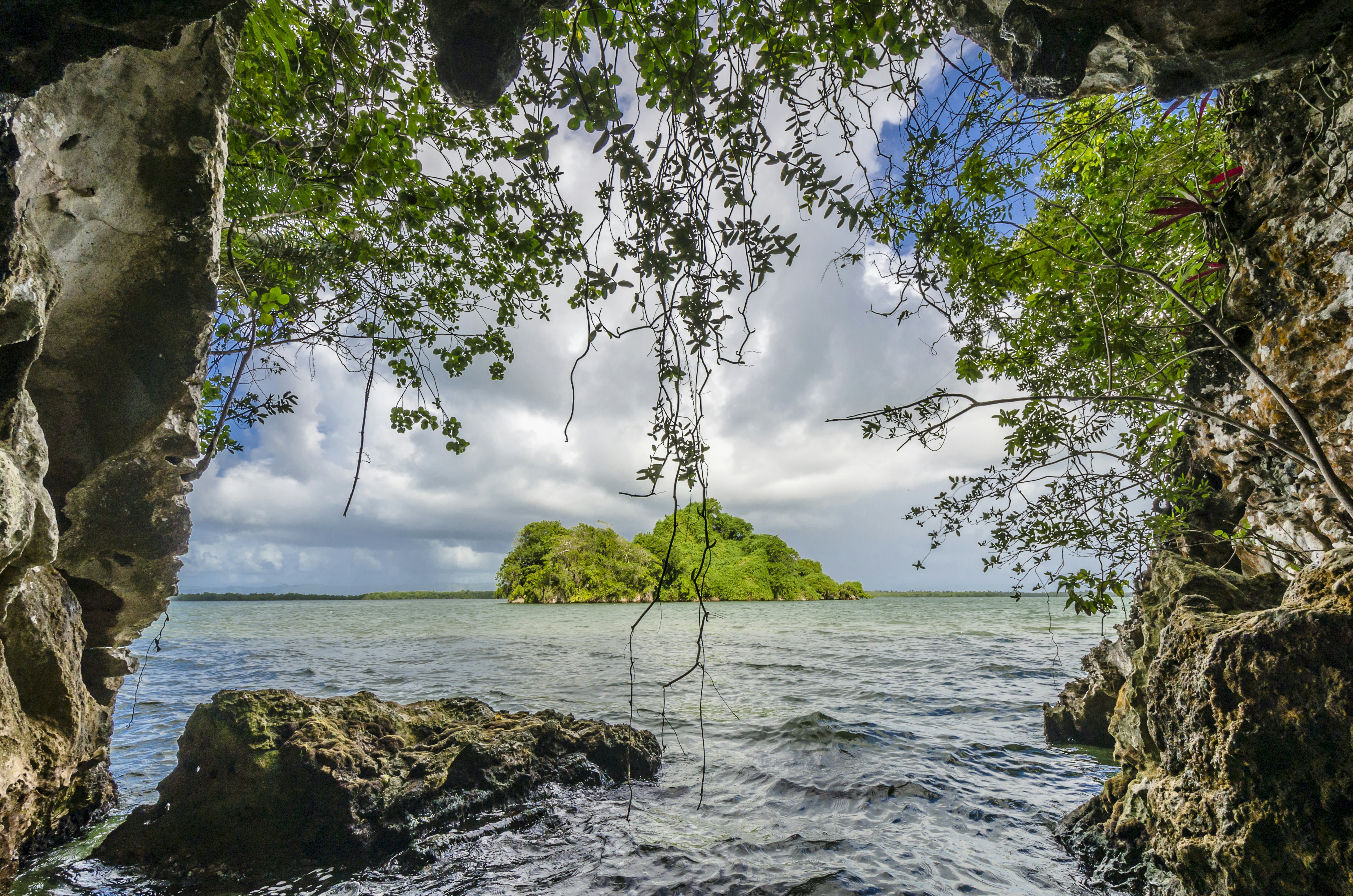 A view of an island from the rocky shore in Los Haitises National Park, Dominican Republic.