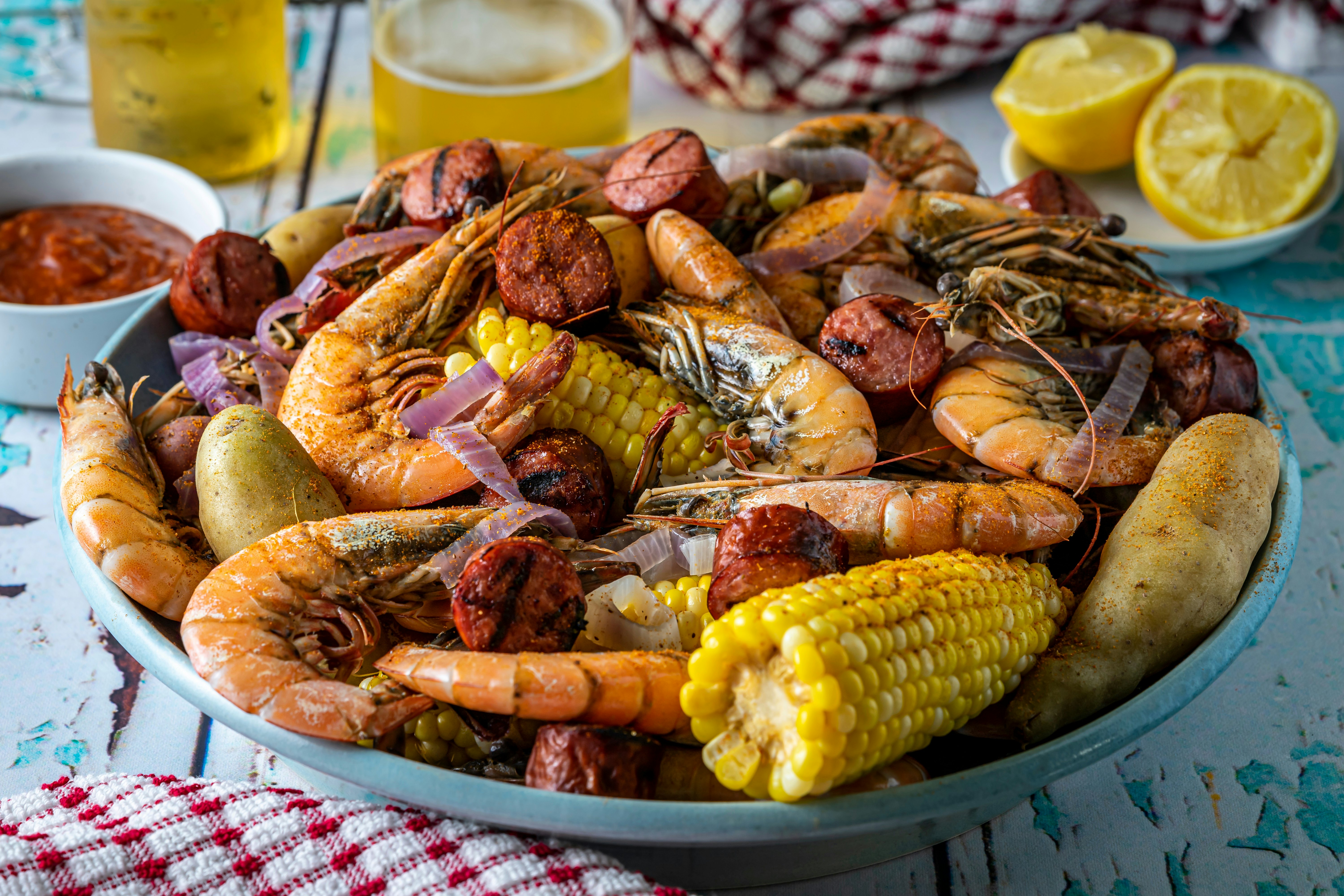 Traditional Southern U.S. Low Country boil with corn, shrimp and sausage.